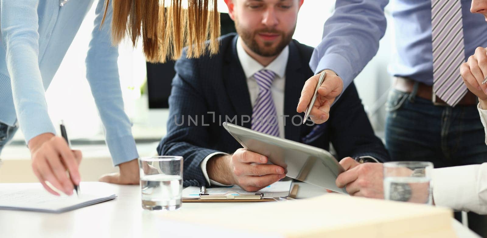 Portrait of coworkers busy in office, solve and discuss current problems, chaos on working place. Teamwork, creative project deadline. Chaos, mess concept