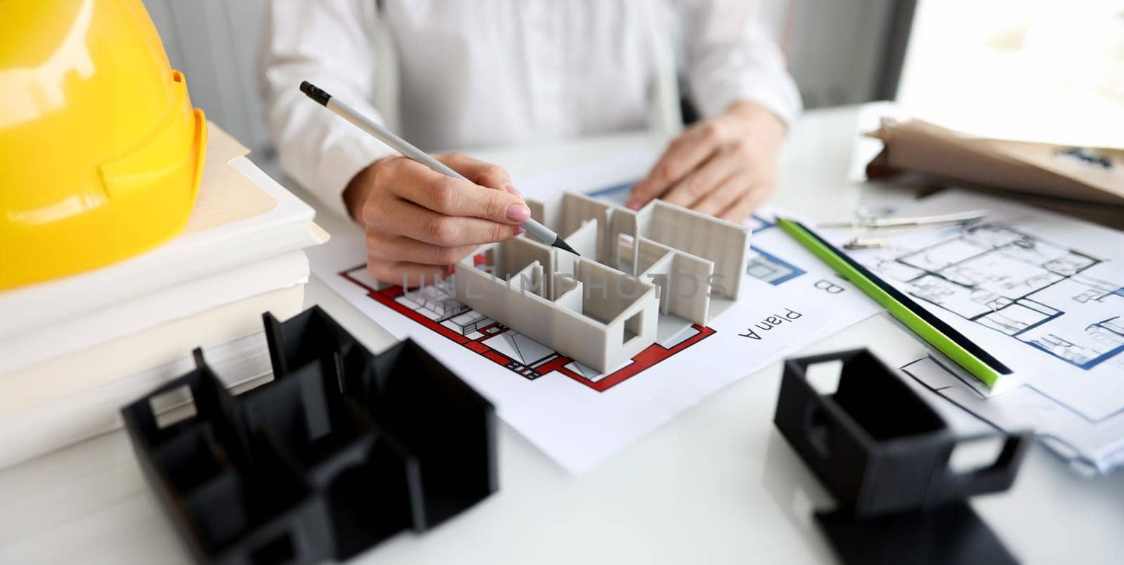 Architect shows layout of house or apartment. Design and construction of housing concept