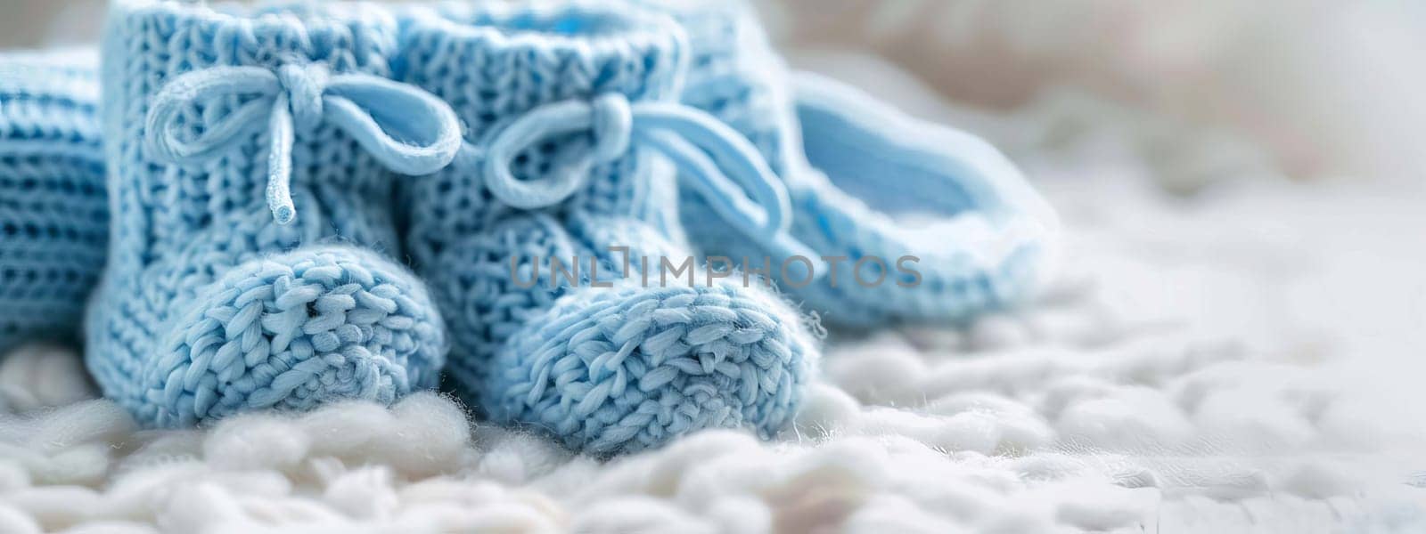 baby booties on a white background. Selective focus. Generative AI,