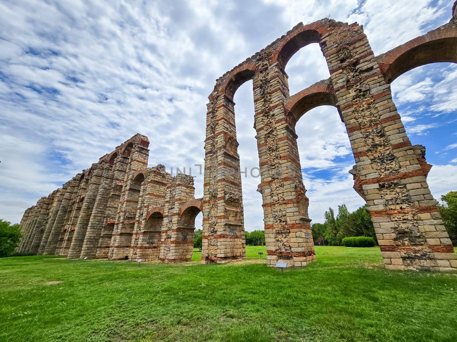 The Acueducto de los Milagros, Miraculous Aqueduct in Merida, Extremadura, Spain is a ruined Roman aqueduct bridge, part of the aqueduct built to supply water to the Roman colony of Emerita Augusta