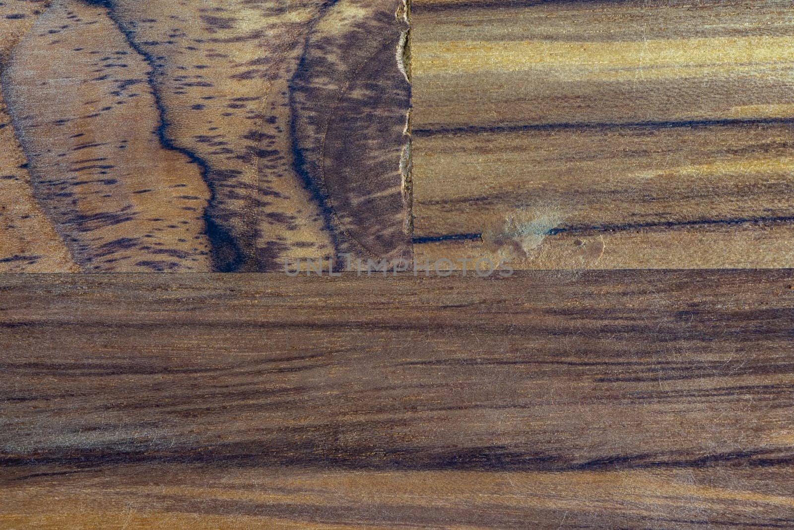 Abstract background photo from some dark wood, with a lot of texture.