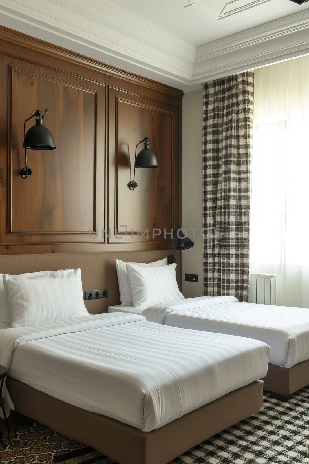 Twin bedroom in a classic design with wooden furnishings and checkered curtains, offering a cozy stay