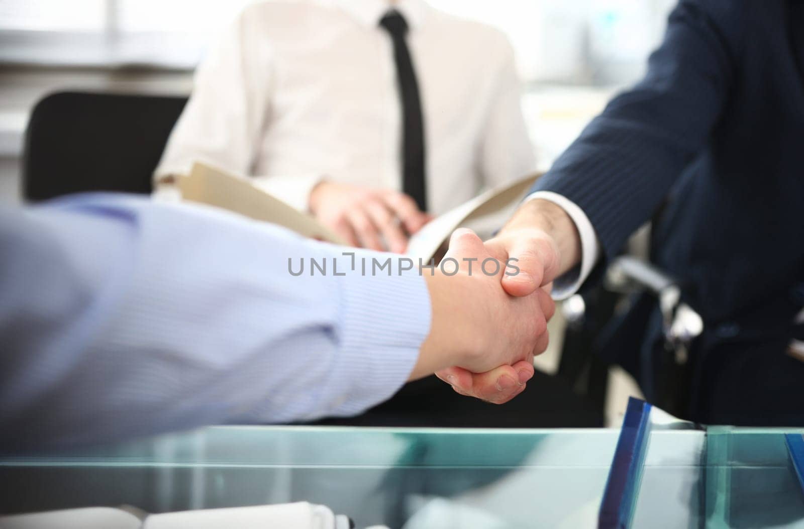 Man in suit and tie give hand as hello in office closeup. Friend welcome mediation offer positive introduction thanks gesture summit executive approval motivation male arm strike bargain concept