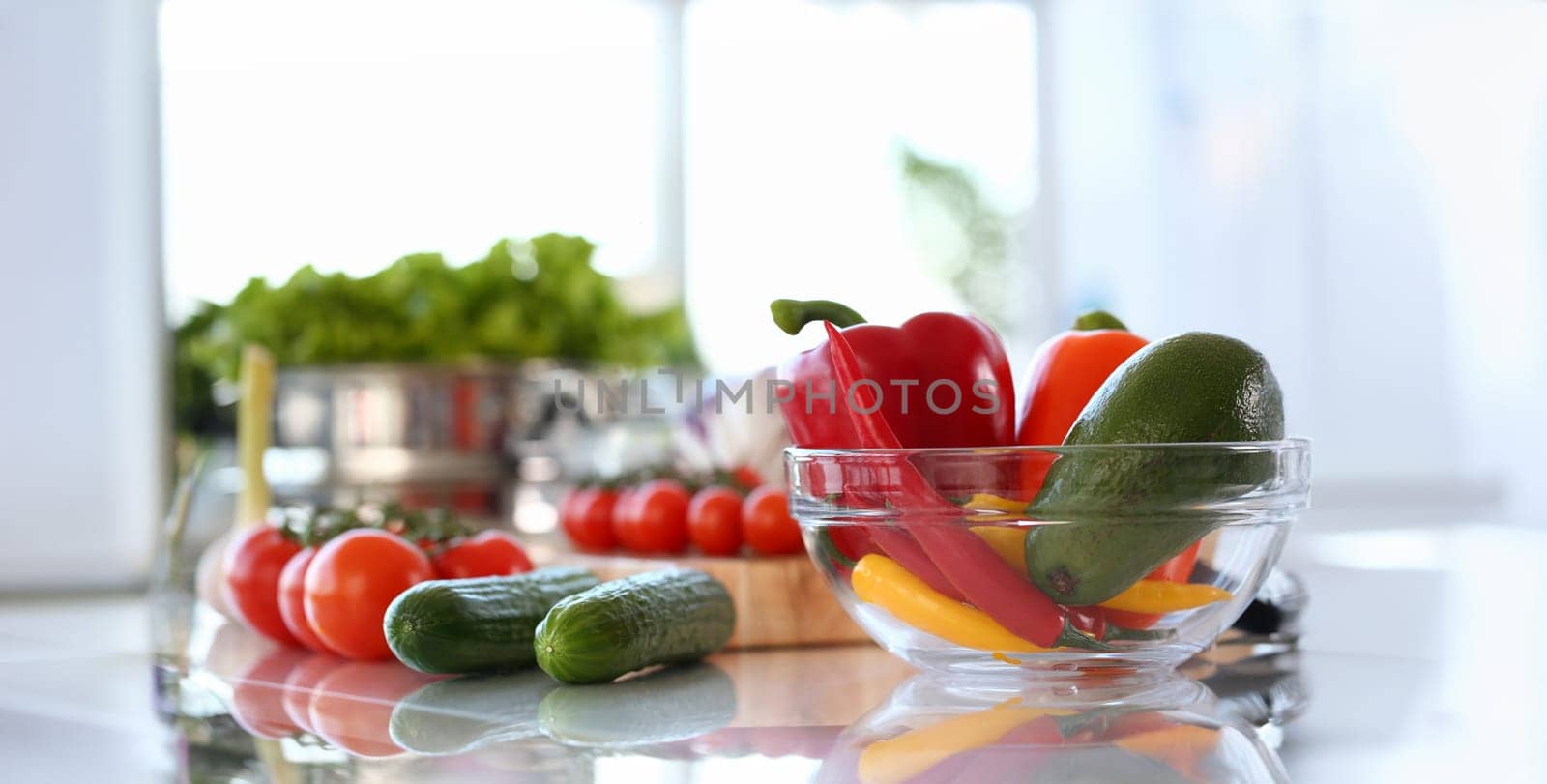 Fresh Raw Chilli Pepper Assortment Photography. Vegetable Ingredient on Kitchen Worktop. Red Tomatoes and Green Cucumber. Healthy Vegan Lifestyle. Recipe Blog. Avocado in Bowl Horizontal Shot.