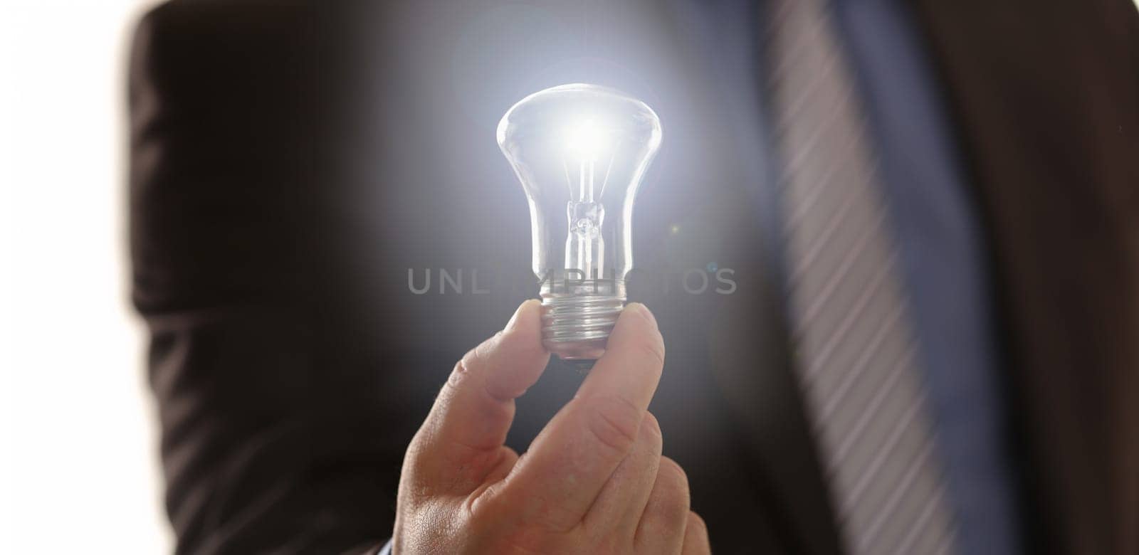 Inspiration Symbol Saving Electric Energy Idea. Man Entrepreneur Holding Traditional Light Bulb. Formal Suit Businessman with Lamp in Hand. Innovation Technology New Business Vision