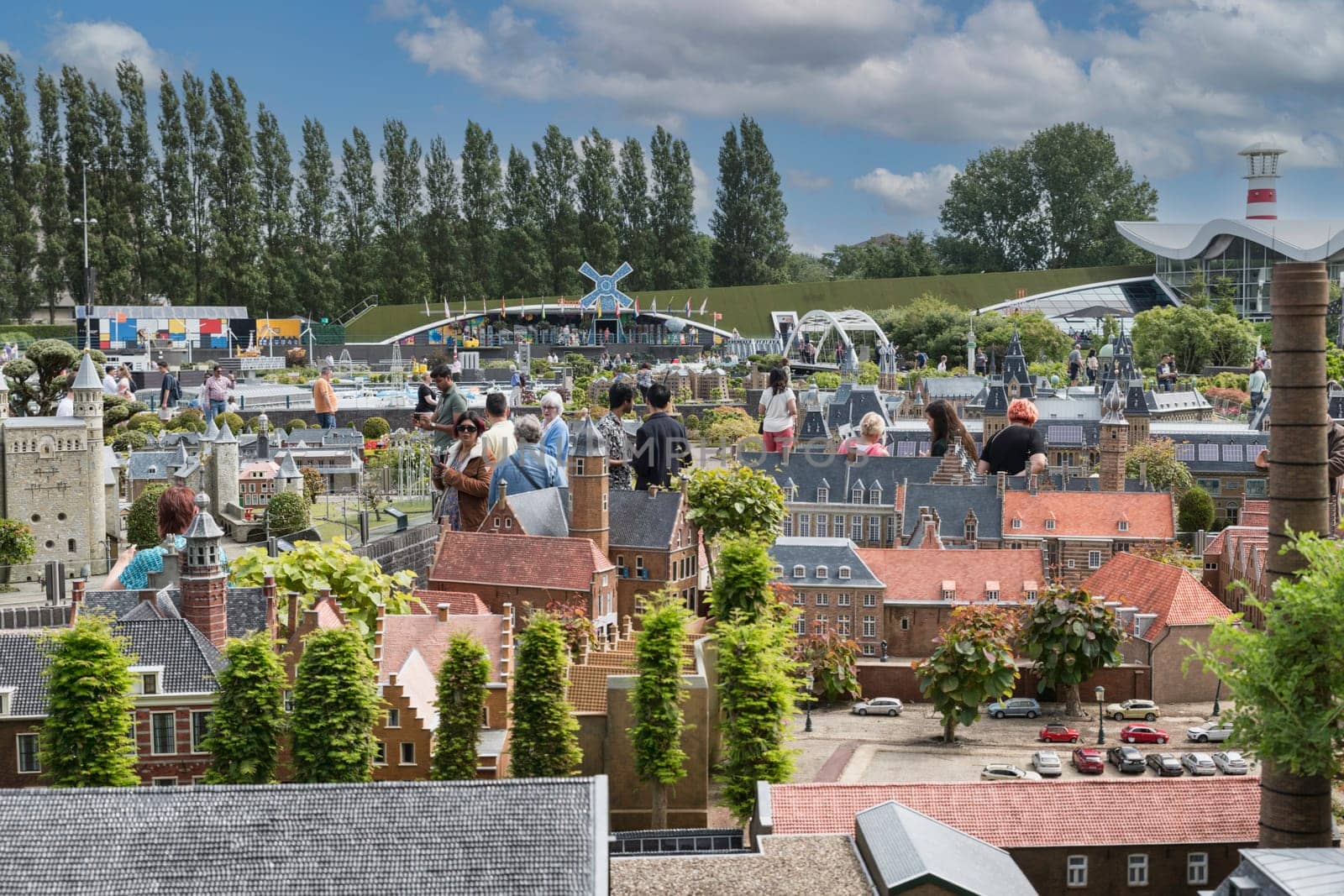 den haque,holland,9-07-2024:,Visitors enjoying the replicas of famous dutch buildings as a tourist attraction in Madurodam park buildings from all parts of the Netherlands.