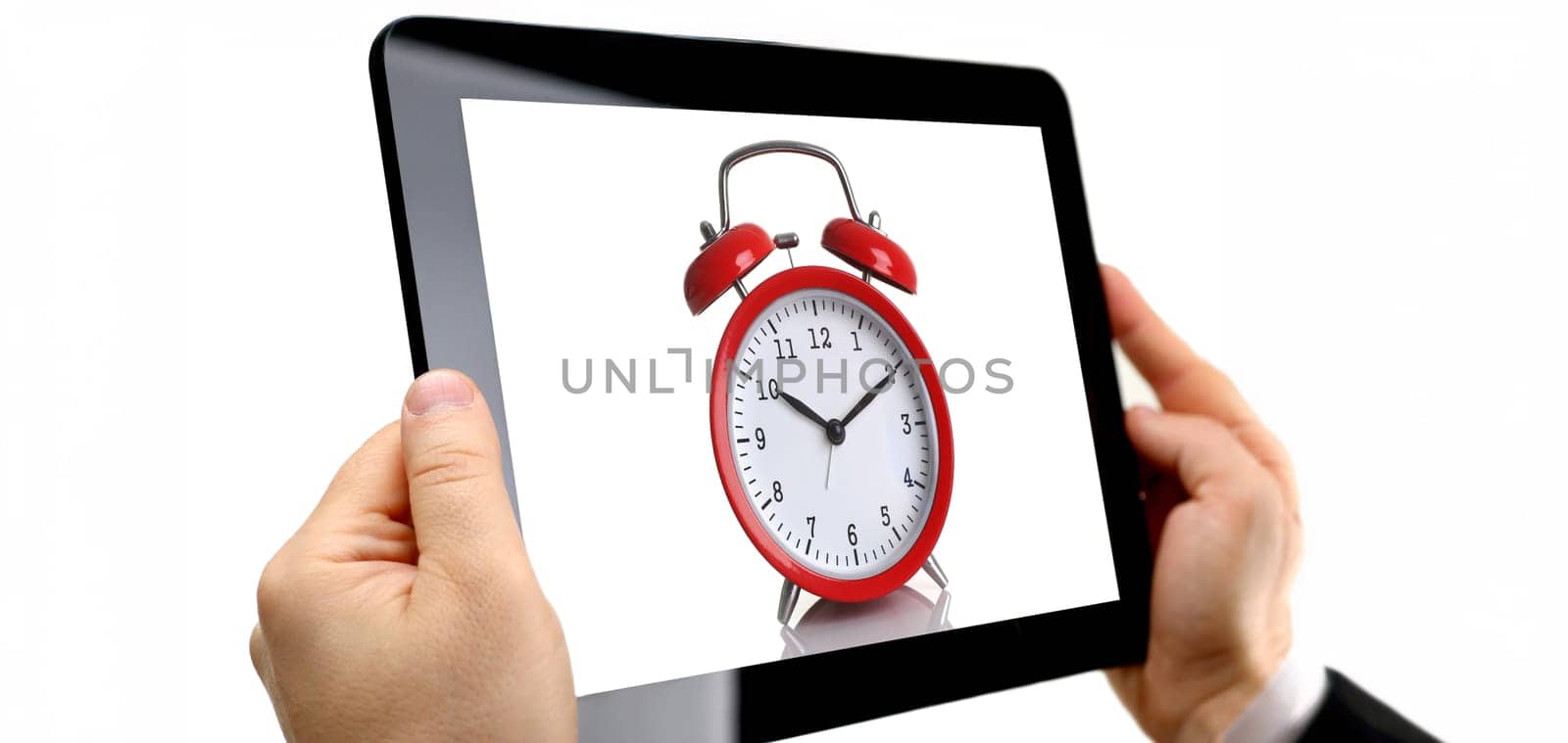Man hoding black tablet frame in hand isolated on white closeup. Can insert an image image your text for the concept or project development to mobile applications, their advertising for mobile devices
