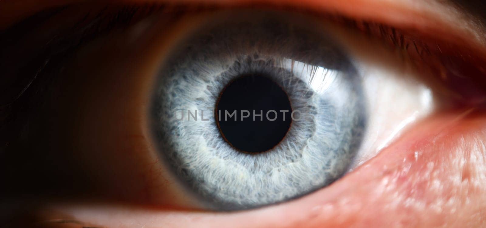 Blue eye male human super macro closeup. Healthy vision test concept