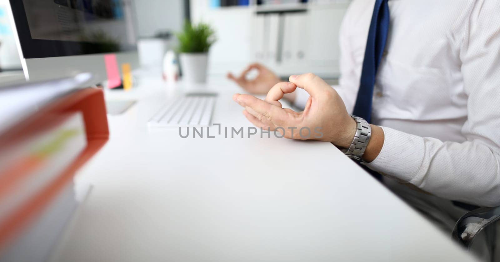 Focus on hands of calm man working modern high-tech computer for information of business document storage. Businessman analyze marketing data. Stress relieve concept