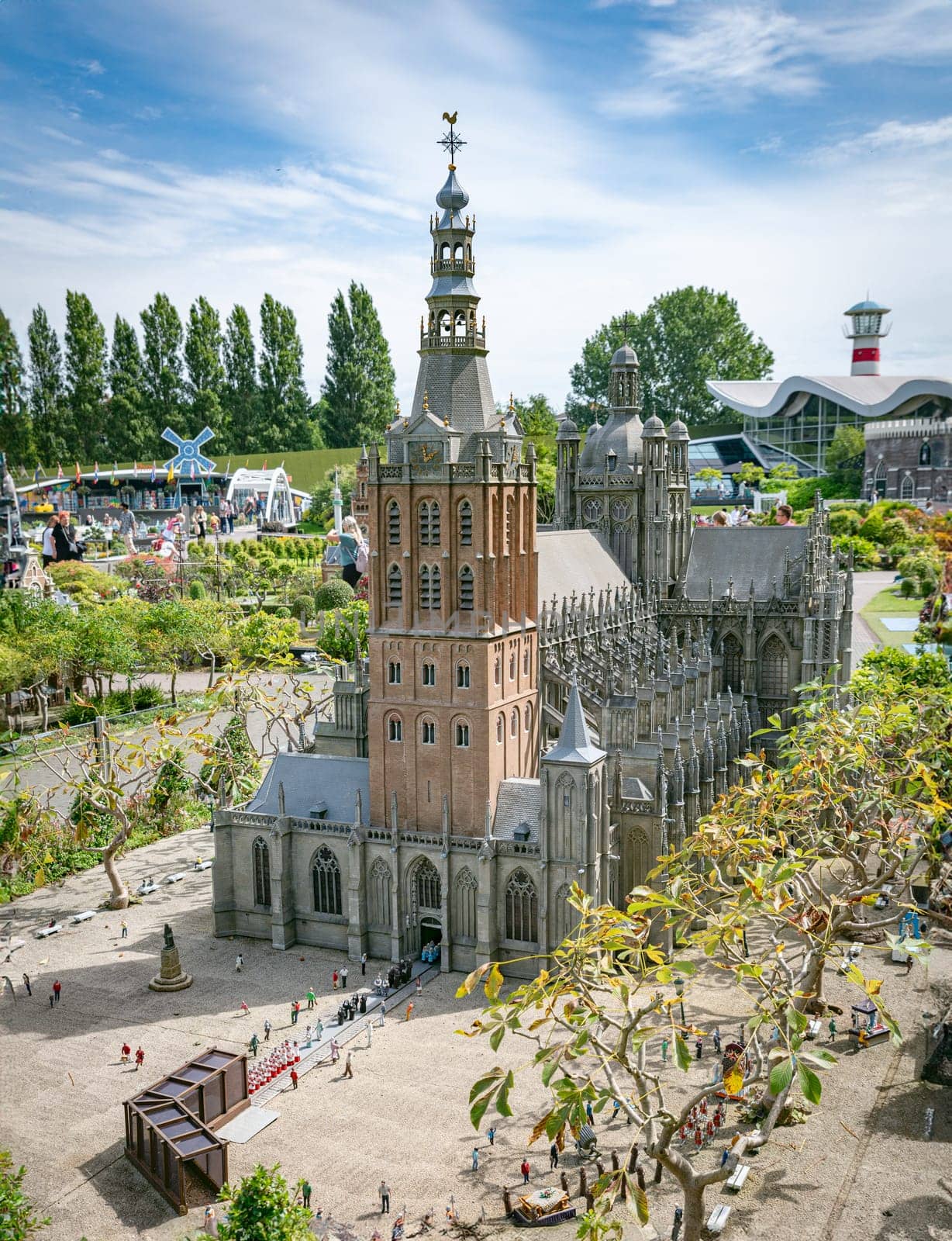 den haque,holland,9-07-2024:,Visitors enjoying the replicas of famous dutch buildings as a tourist attraction in Madurodam park buildings from all parts of the Netherlands.