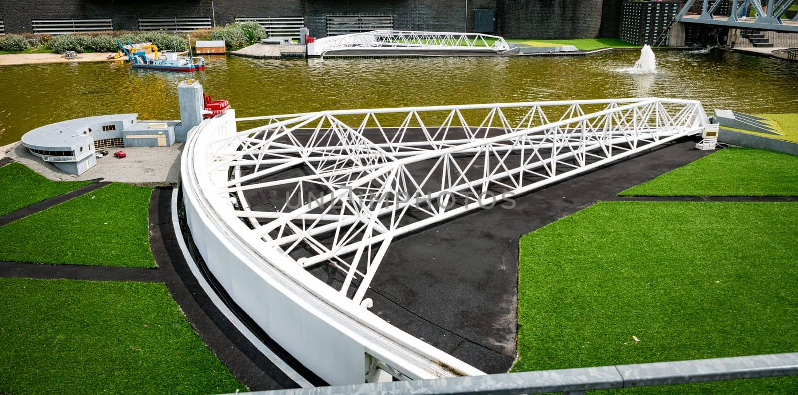 den haque,holland,9-07-2024:,the maesland barrier, part of the dutch delta works replica as a tourist attraction in Madurodam park buildings from all parts of the Netherlands.