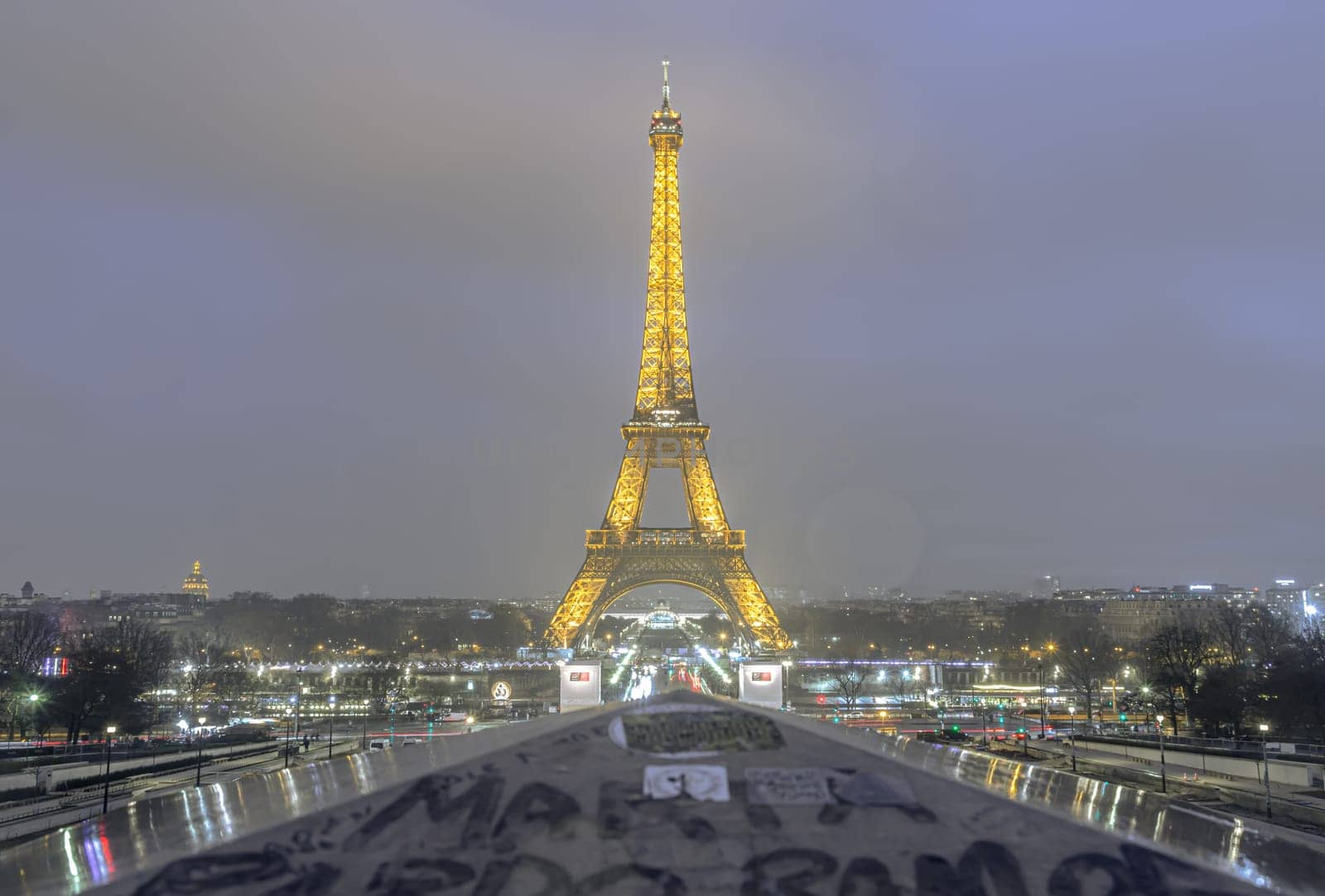 France, Paris - Jan 02, 2024 - Nice scenery of Famous Eiffel Tower with dark sky background in Paris at night. View from Trocadero view point , one of the best-known landmark and national symbols of france, Space for text, Selective focus.