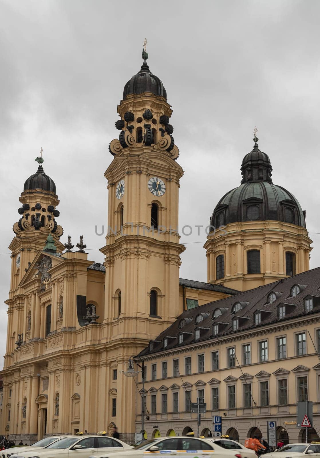 Munich, Germany - Dec 21, 2023 - Exterior architecture of The Theatine Church of St. Cajetan and Adelaide (Theatinerkirche St. Kajetan und Adelheid) a Catholic church on Odeonsplatz in Munich. Space for text, Selective focus.