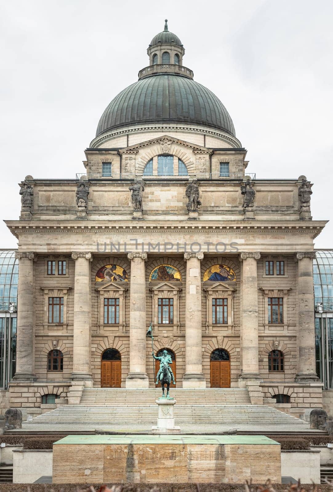 Munich, Germany - Dec 21, 2023 - Architecture exterior of Bayerische Staatskanzlei is a government building with Monument in front of entrance. Bavarian State Chancellery building (the former Bayerische Armeemuseum, Bavarian Army museum), Space for text, Selective focus.