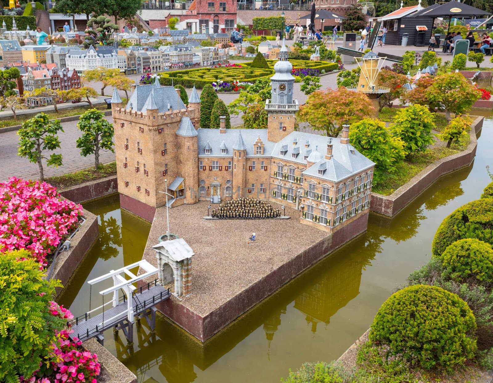 den haque,holland,9-07-2024:,Visitors enjoying the replicas of famous dutch buildings as a tourist attraction in Madurodam park buildings from all parts of the Netherlands.