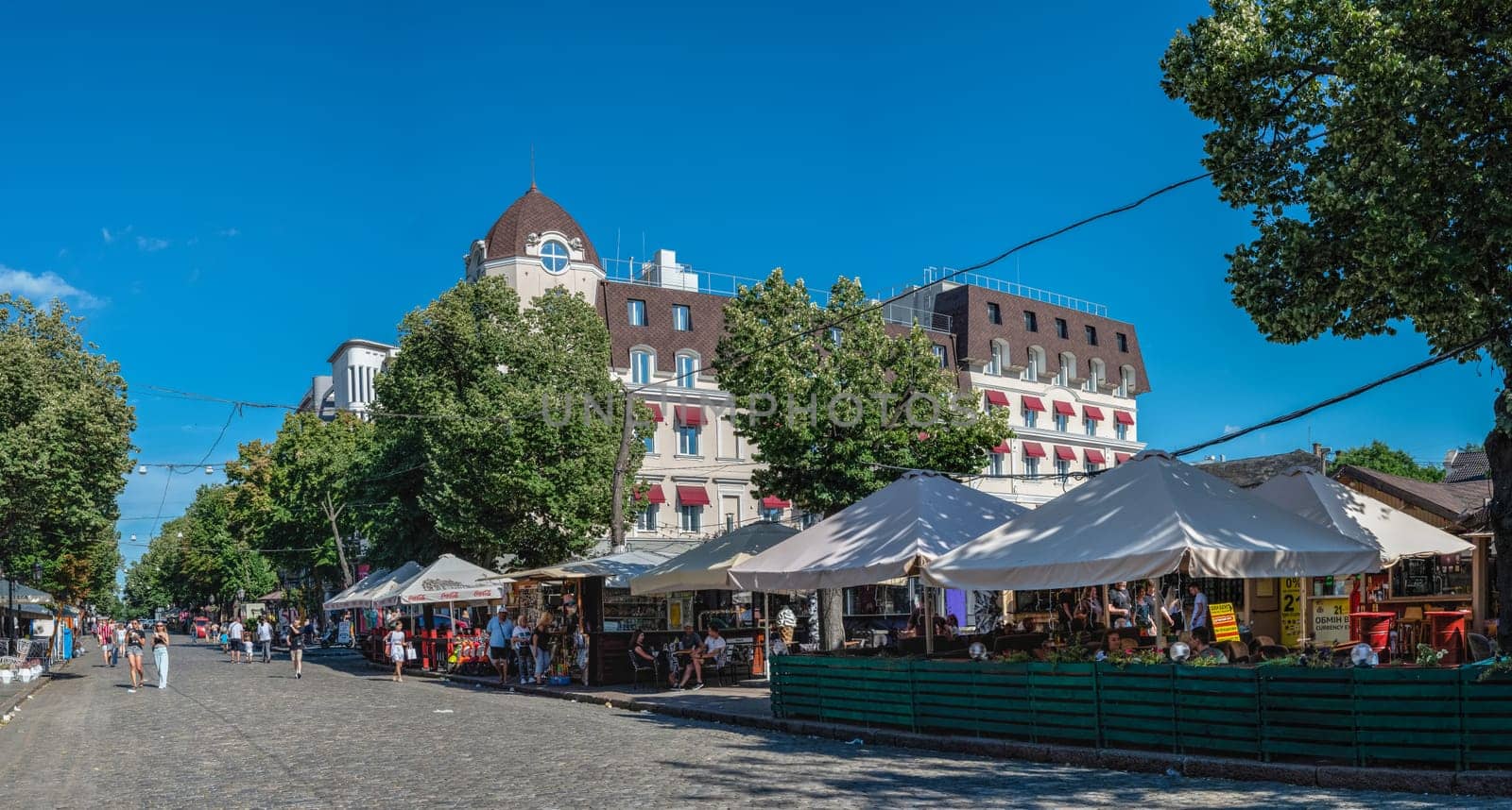 Odessa, Ukraine 25.07.2023. Historic buildings on the Deribasovskaya street in Odessa, Ukraine, on a sunny summer day