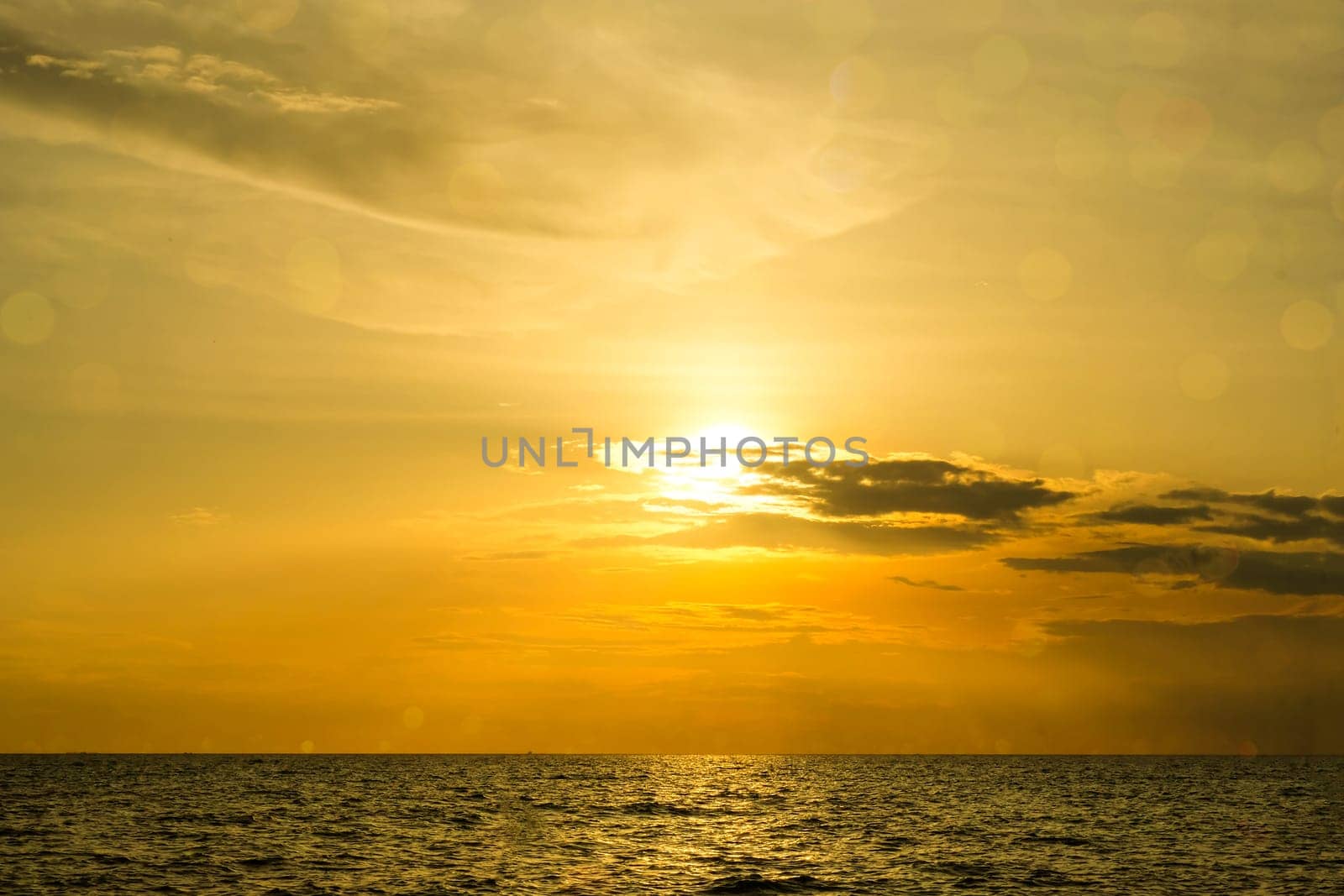 Sunset over the water on the Gulf of Thailand. by samunella