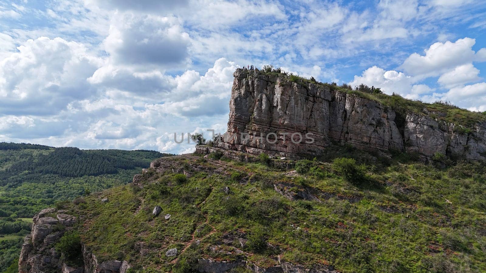 Saone et Loire,France,25-05-2024: , Solutre Pouilly, the rock of Solutre and vineyard fall in france near macon, high rock that people can climb