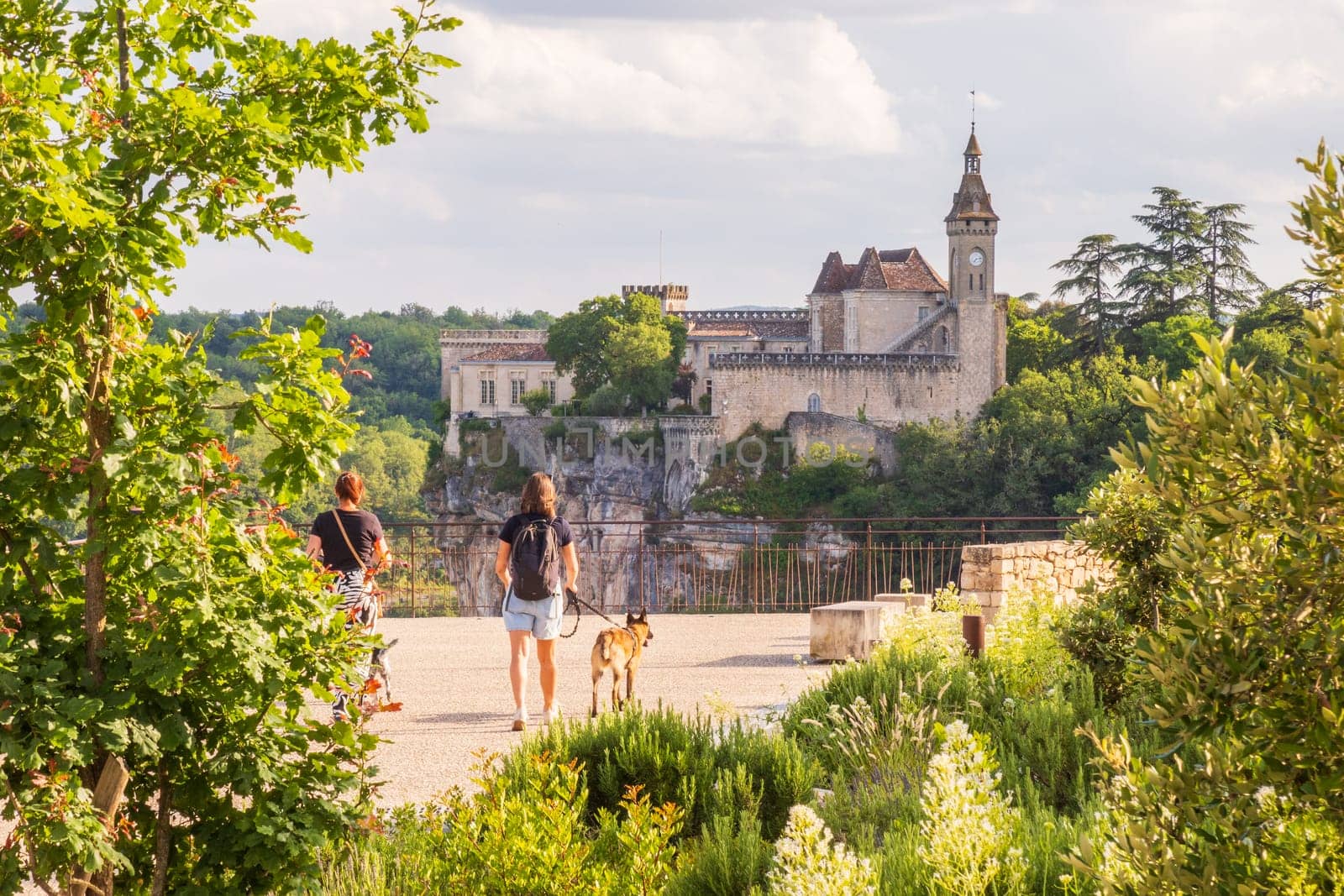 Rocamadour, France - June 17 2024: Girls walking to Citadel of Rocamadour city, famous travel destination in France