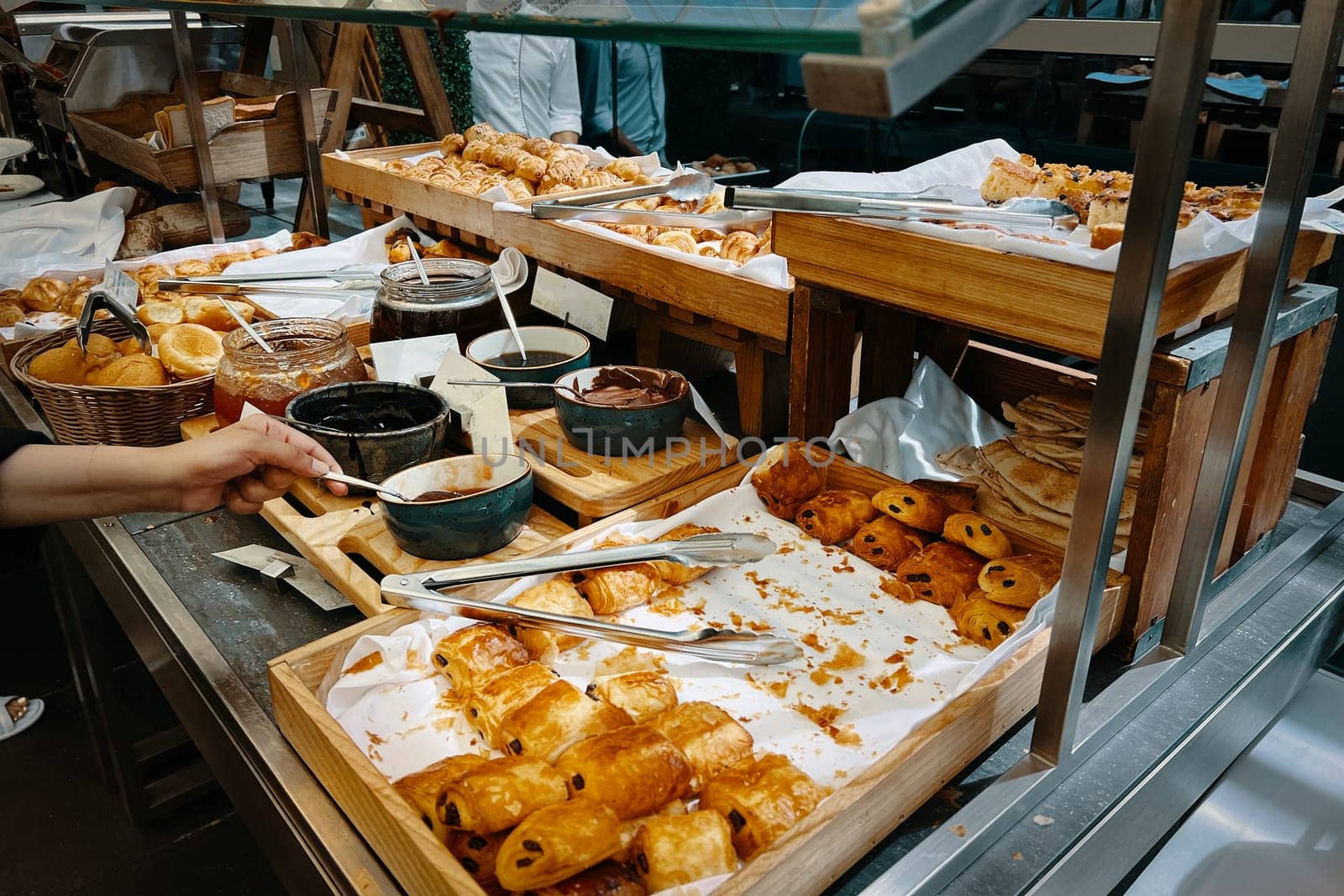 A variety of flaky morning croissants, fresh pastries, and the hotel's breakfast buffet.