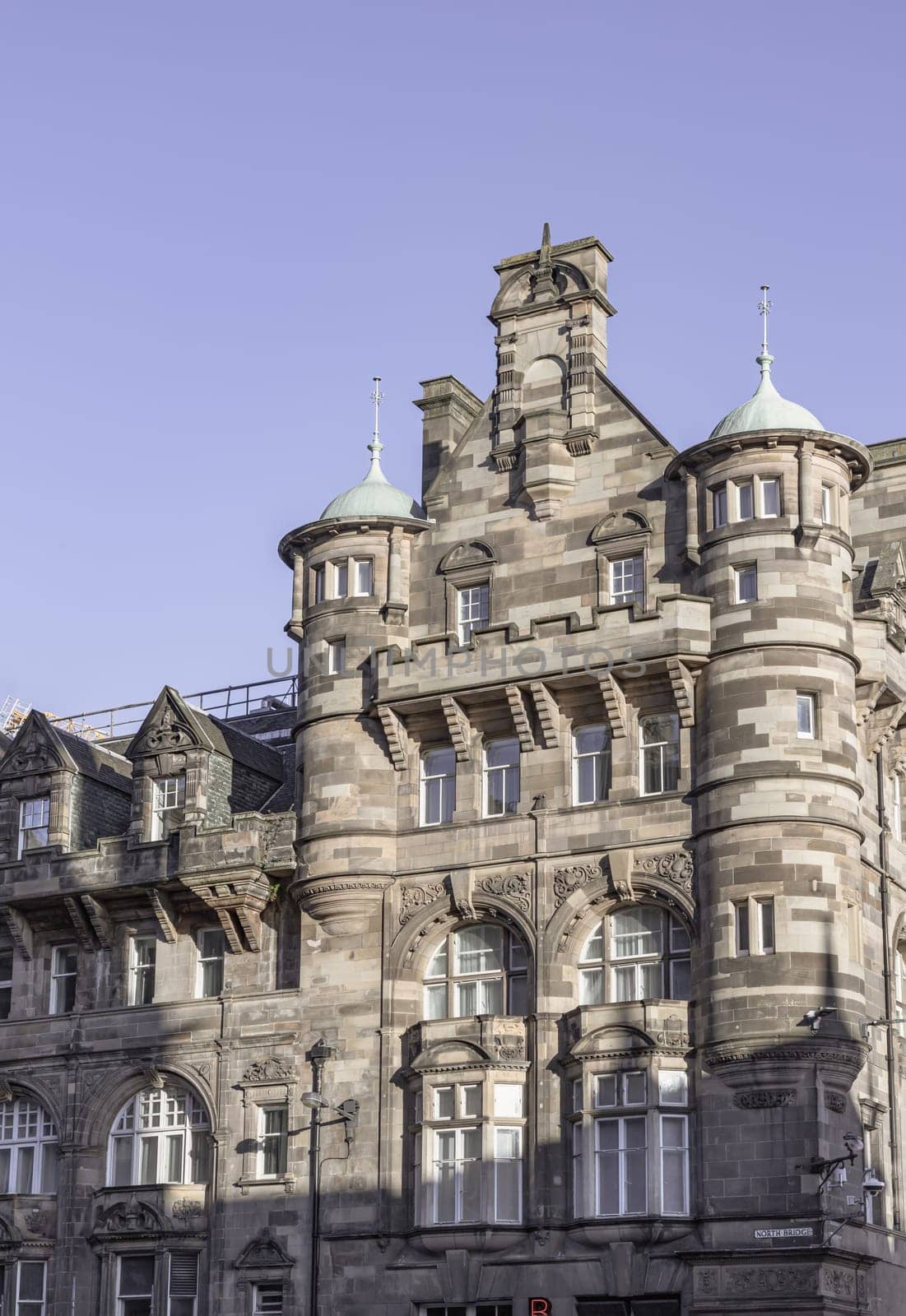 Edinburgh, Scotland - Jan 18, 2024 - Exterior view of Carlton Hotel (Patrick Thomson Department Store) on the corner of North Birdge and High Street in Royal Mile, Space for text, Selective focus.