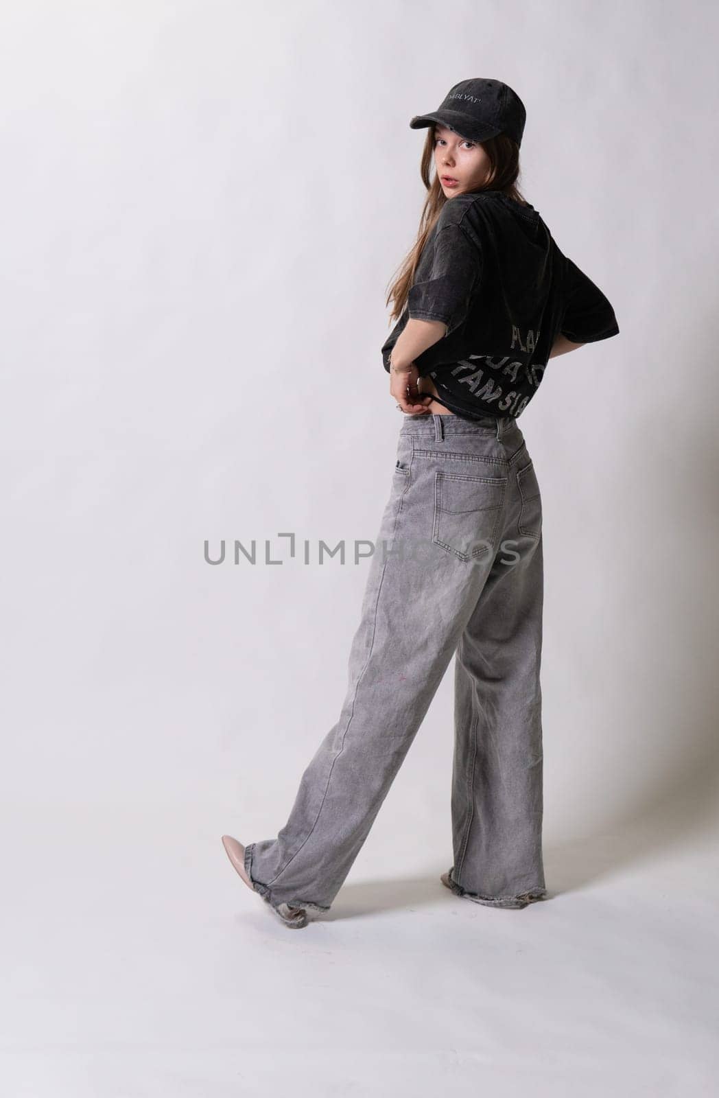 posing jacket female jeans cap girl stylish pure braces woman background casual white