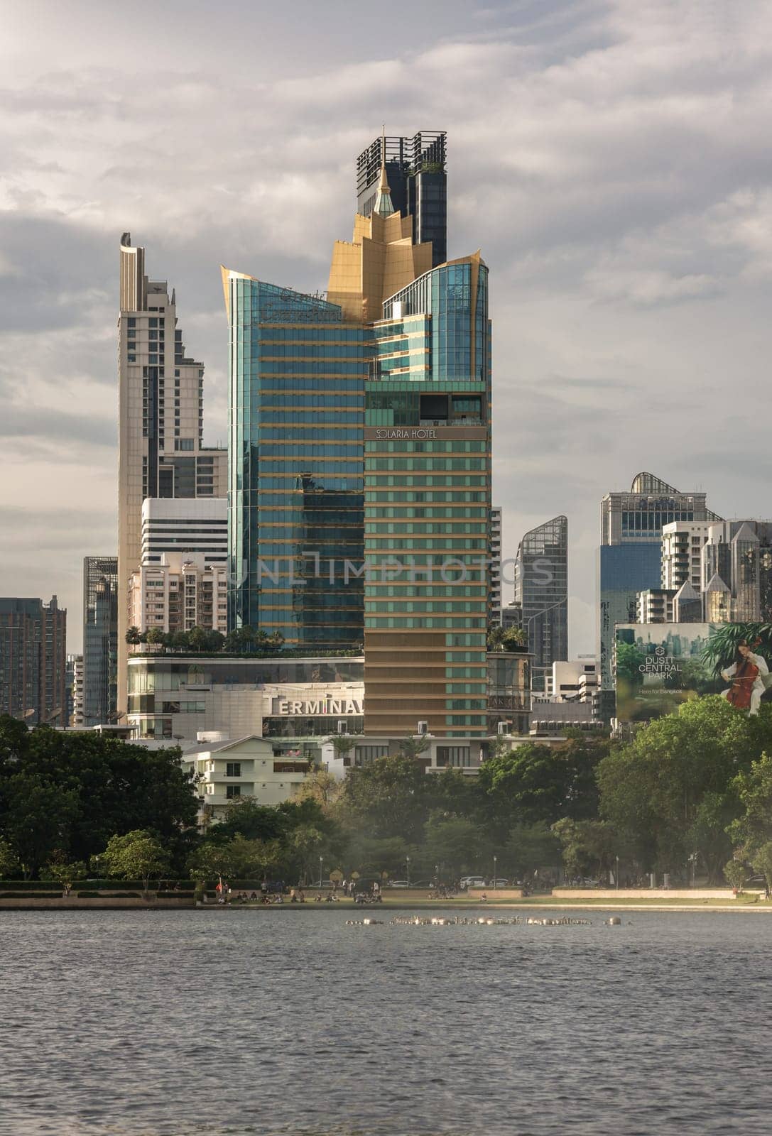Bangkok, Thailand - 22 Jun, 2024 - Cityscape office buildings with modern architecture. Picturesque view of skyscrapers and dramatic sky before sunset, Copy space, Selective focus.