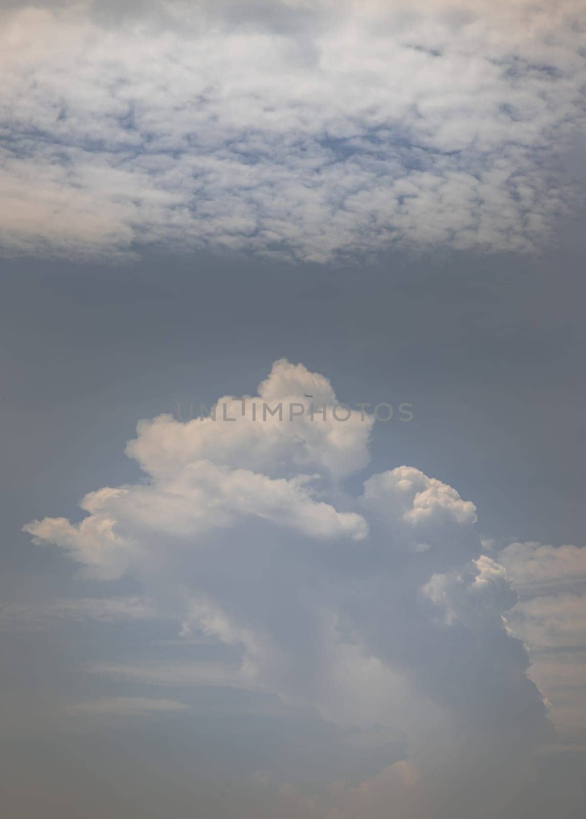 The softness of the white clouds, and sky with the light shining from an interesting light pattern against the sky. Cirrocumulus clouds, Skies landscape, Concept idea of Imaginative clouds nature, Cloud cluster can be used for graphics works and resource.