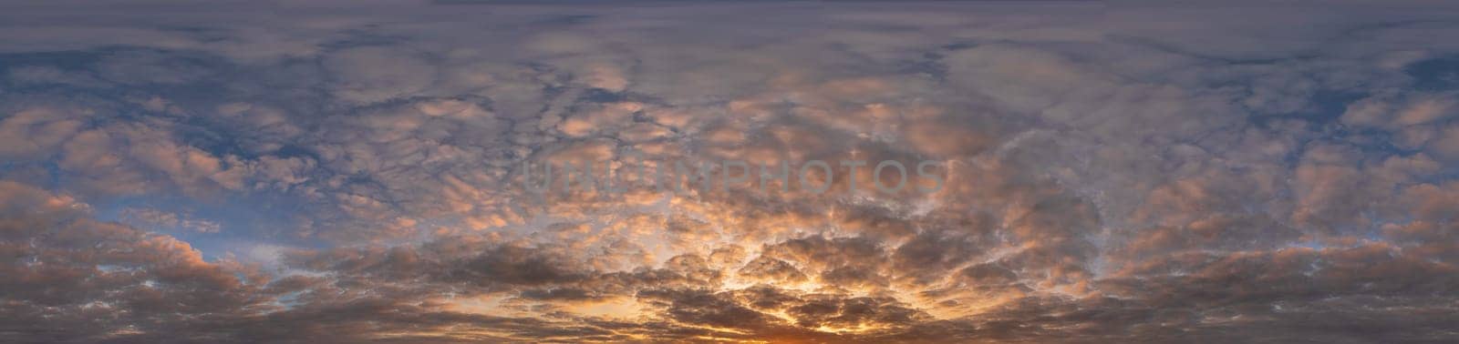 Golden sunset sky panorama Seamless spherical equirectangular 360-degree view with beautiful Stratocumulus clouds, setting sun - for use in 3D graphics as a sky dome or post-processing of drone images
