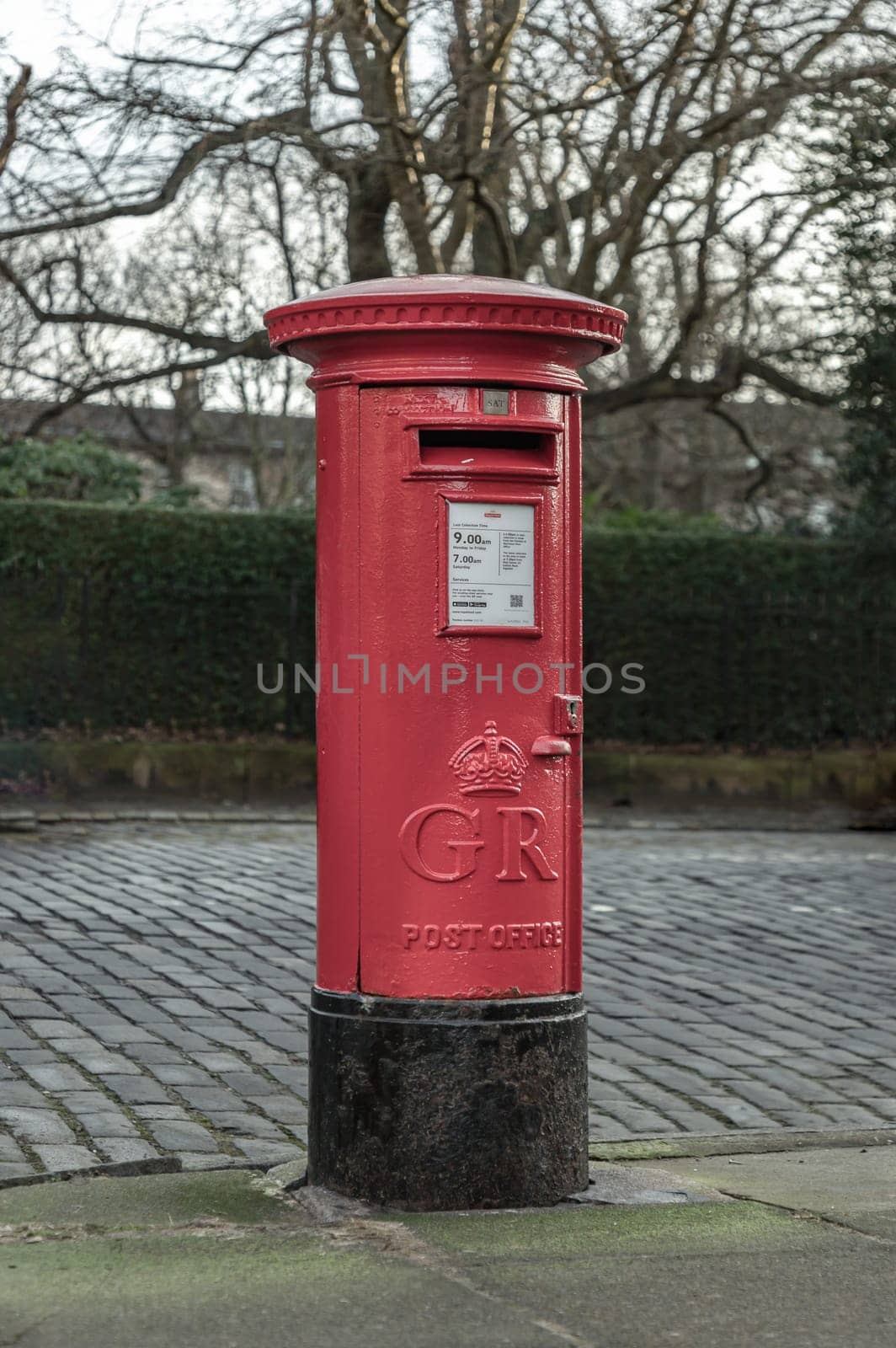 Edinburgh, Scotland - Jan 19, 2024 - Retro Royal Mail Red Post Box. Traditional post boxe, Red Postbox, Great Britain, Space for text, Selective focus.