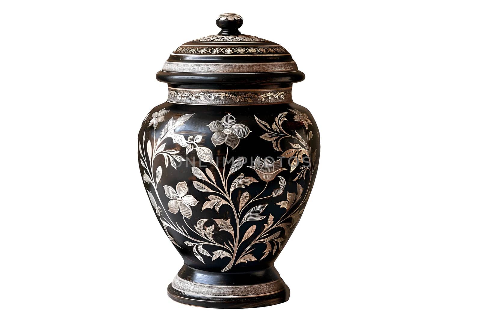 A vase with a floral design sits. The urn with ashes cut out