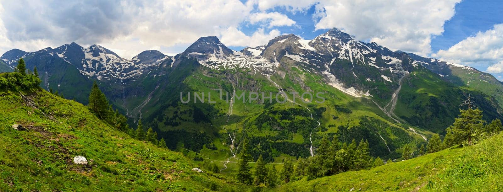 Grossglockner high mountain road in Austria. Surrounded by mountains and green forests. Landscape with nature in the Alps. A great place for sports, recreation and outdoor activity holidays. Großglockner is the highest mountain in Austria at 3798 m above sea level.