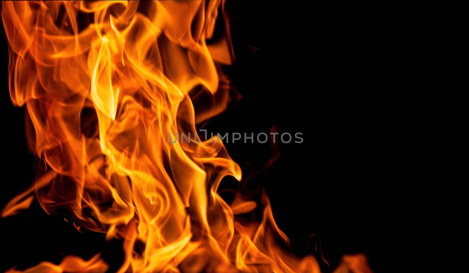 Decorative background with fire flames on black with copy space