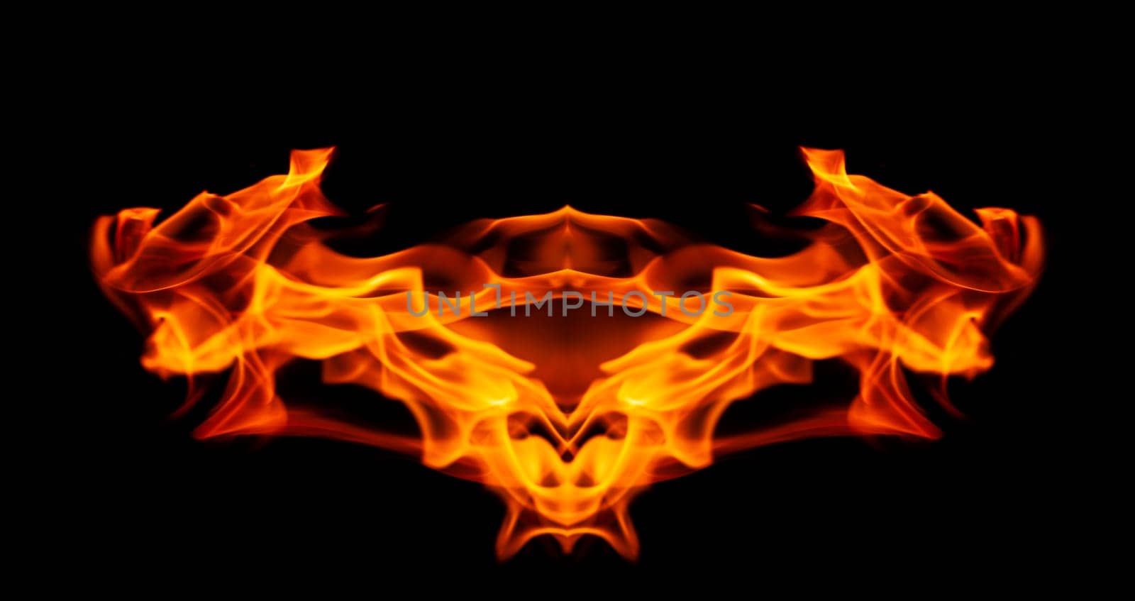 Decorative background with fire flames on black with copy space