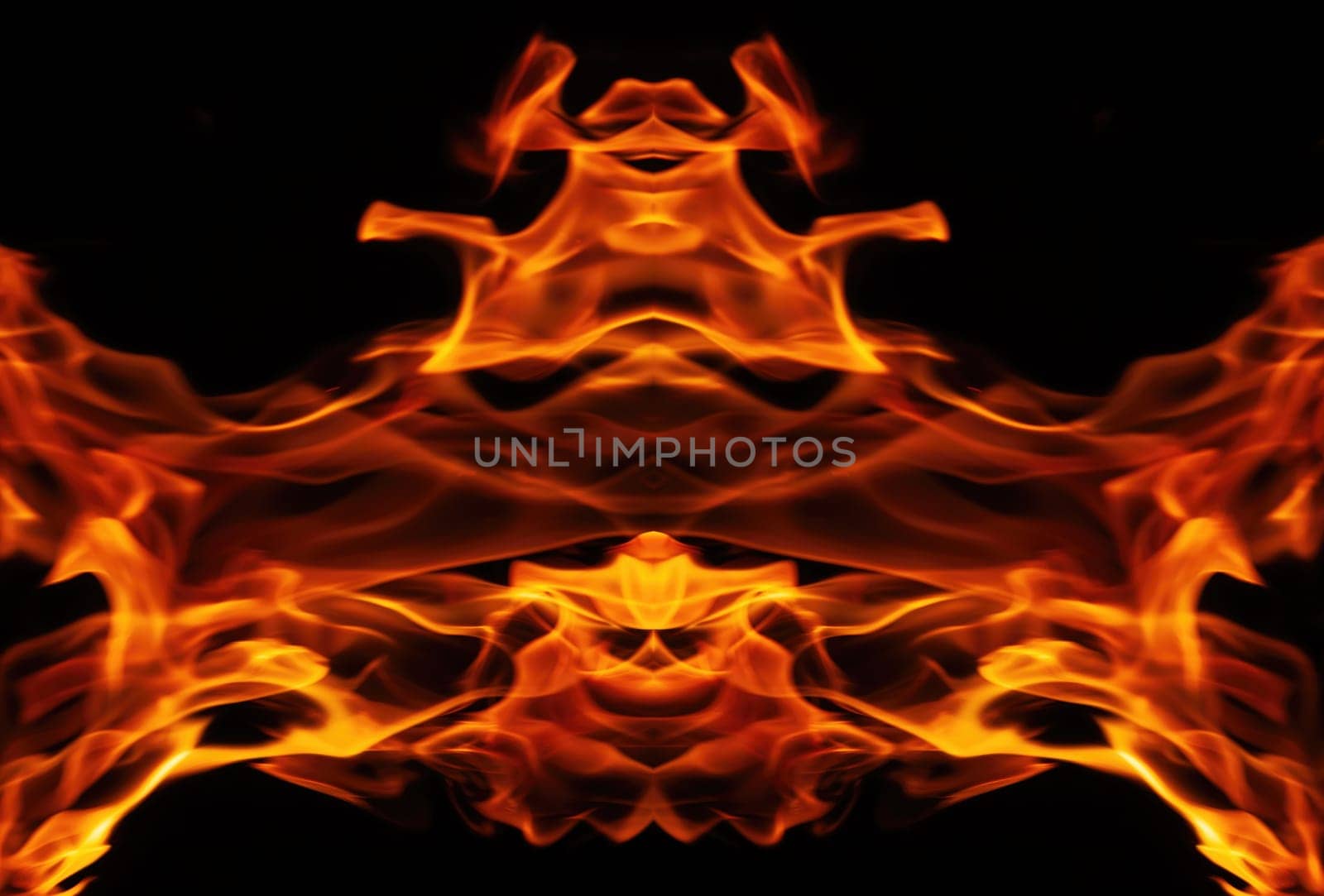 Orange fire flames on a black background