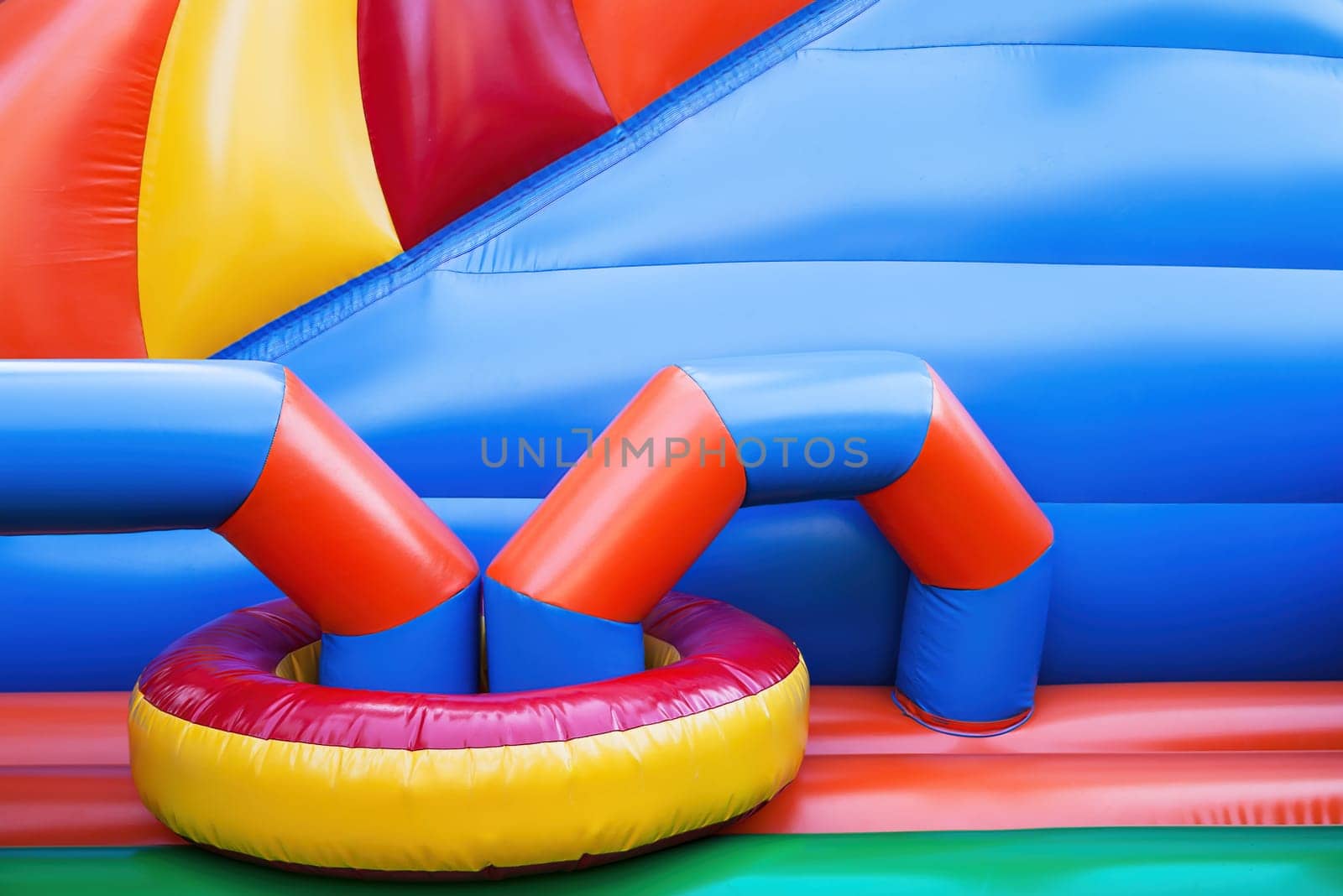 Abstract background and texture of a bright colourful plastic playground for playtime