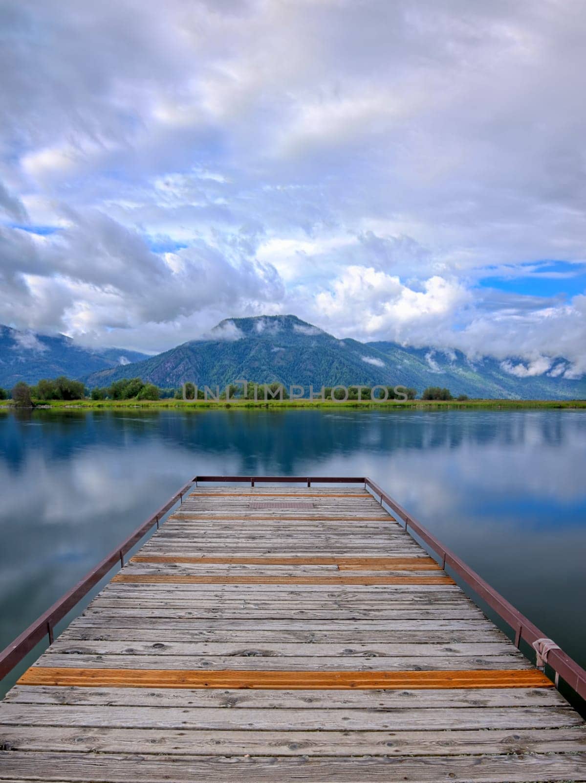 A floating dock on a calm section of Pend Oreille Lake just south east of Sandpoint, Idaho.