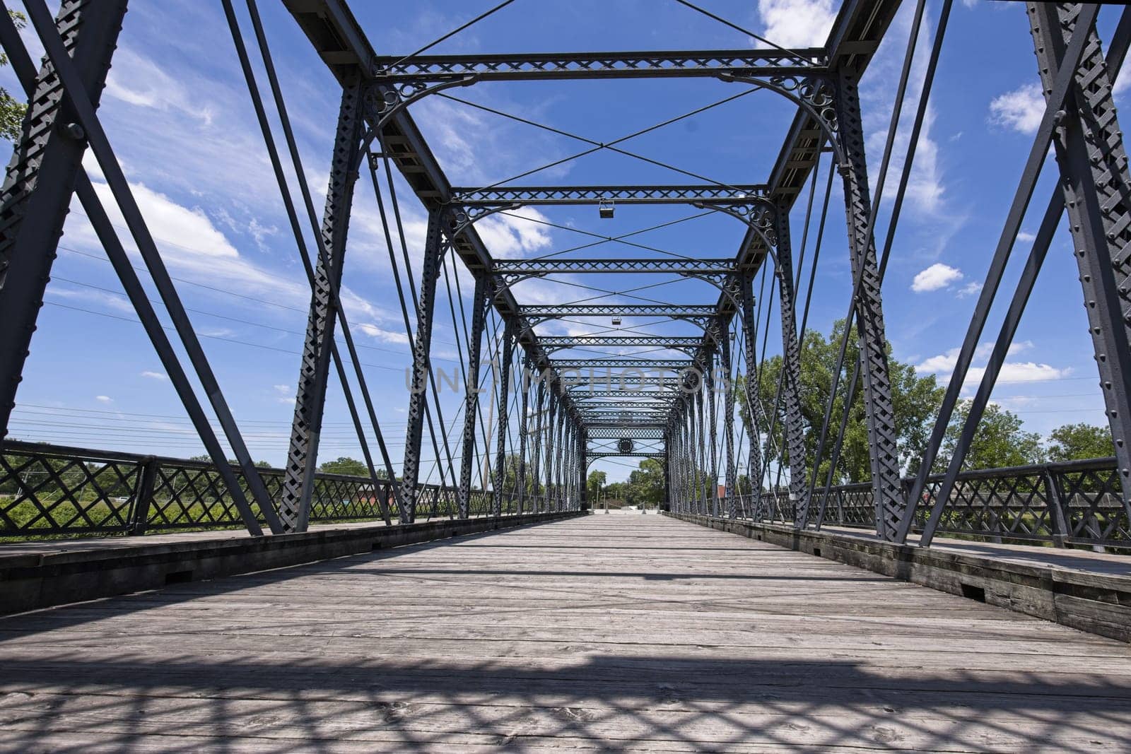 The old Wells Street Bridge on a bright day in downtown Fort Wayne, Indiana.