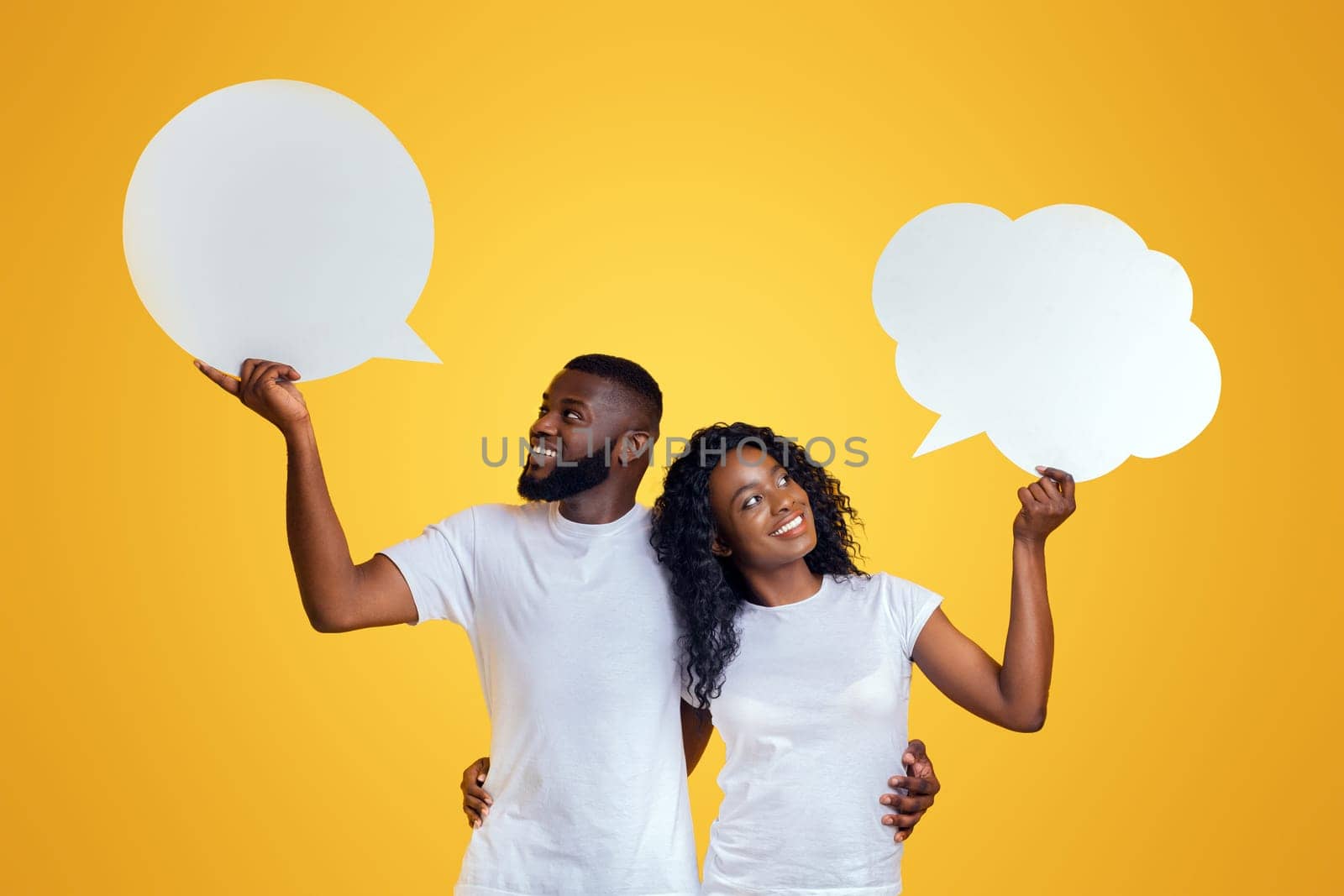 Attractive Black Couple Looking At Communication Bubbles, copy space