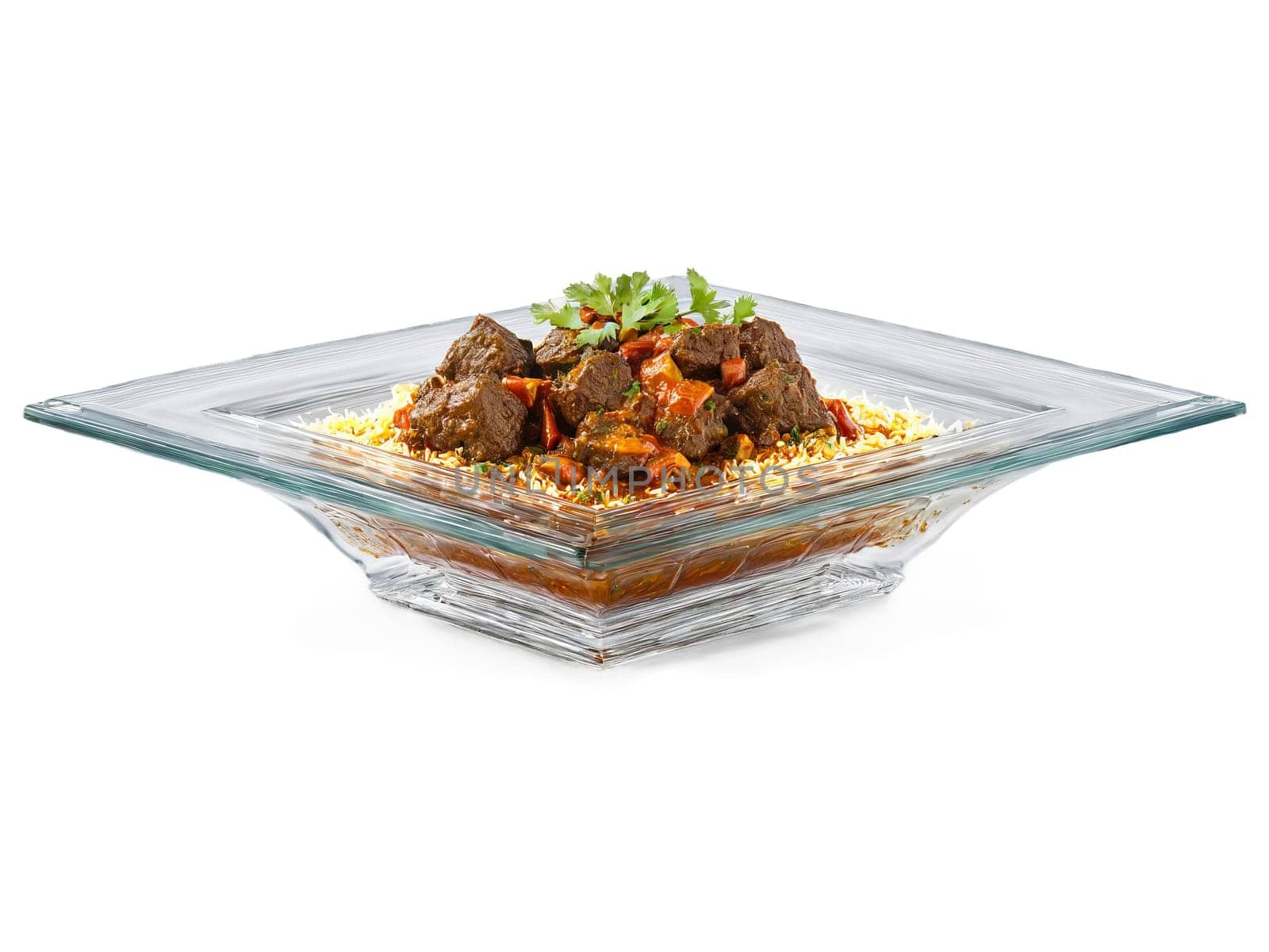 Lamb Madras with a hot and sour curry served on a transparent glass dish fiery. Food isolated on transparent background.