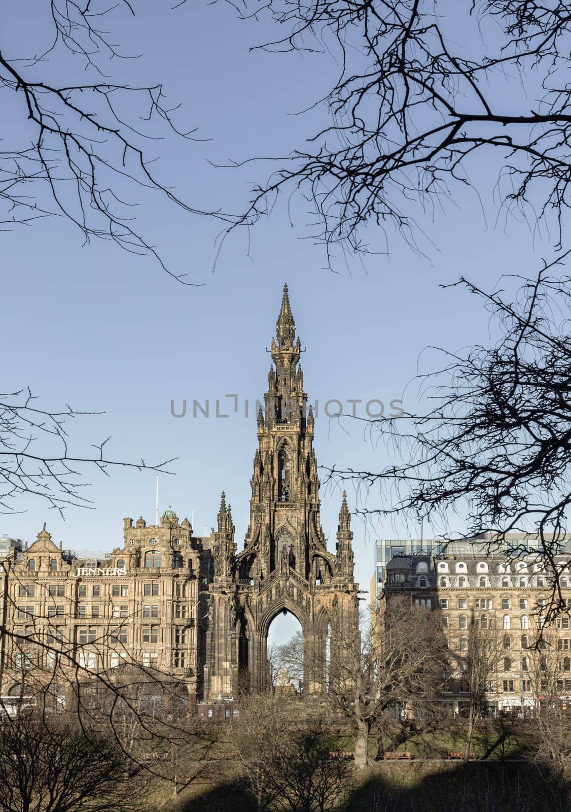 Edinburgh, Scotland - Jan 16, 2024 - A view of The Scott Monument is a Victorian Gothic monument to Scottish author Sir Walter Scott. It is the largest monument to a writer in Princes Street Gardens at the city of Edinburgh. Copy space, Selective focus.