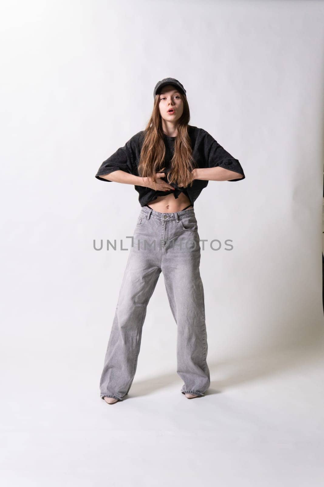 girl pure white posing braces cap woman stylish casual background jeans female jacket