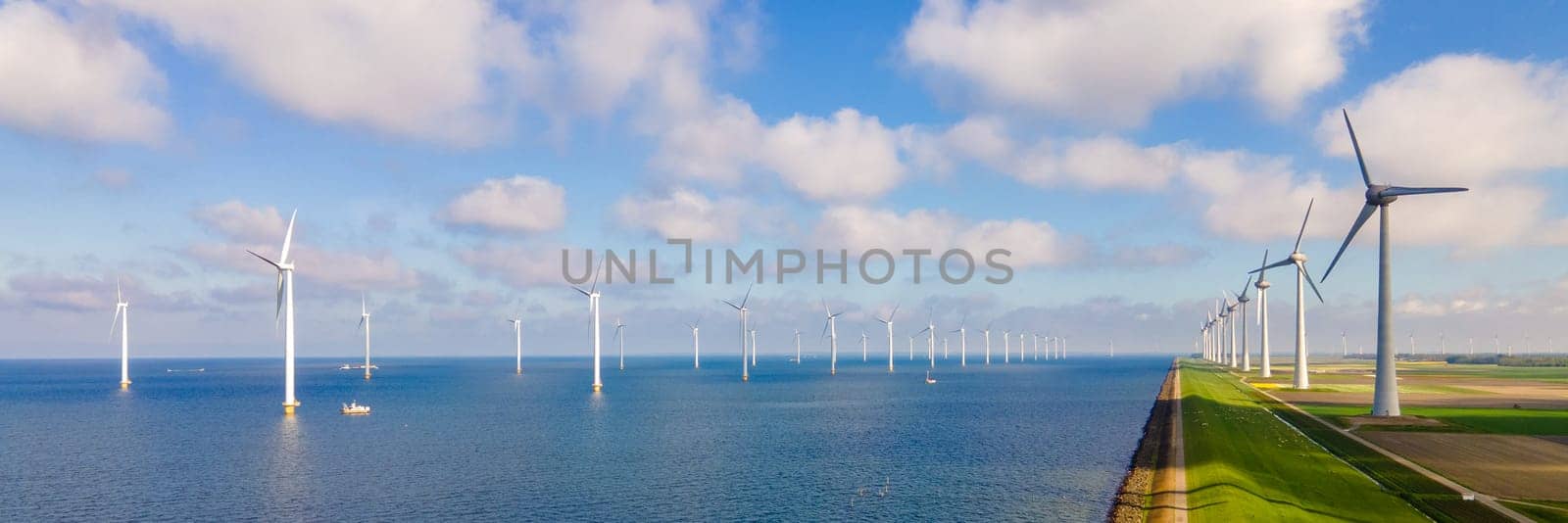 offshore windmill park with clouds and a blue sky by fokkebok