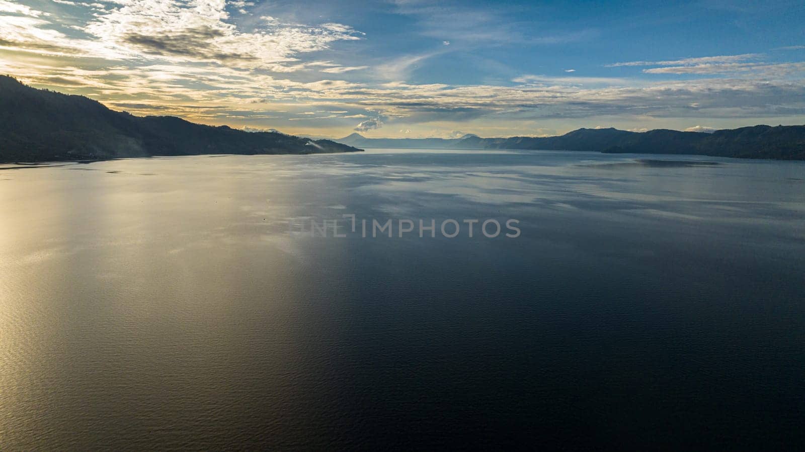 Top view of lake Toba and Samosir Island at sunset. Sumatra, Indonesia.