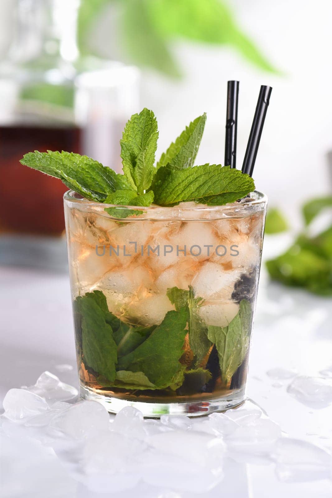 A refreshing mint julep cocktail. Made with bourbon, fresh mint and a hint of sweetness, this is the perfect drink for summer gatherings.