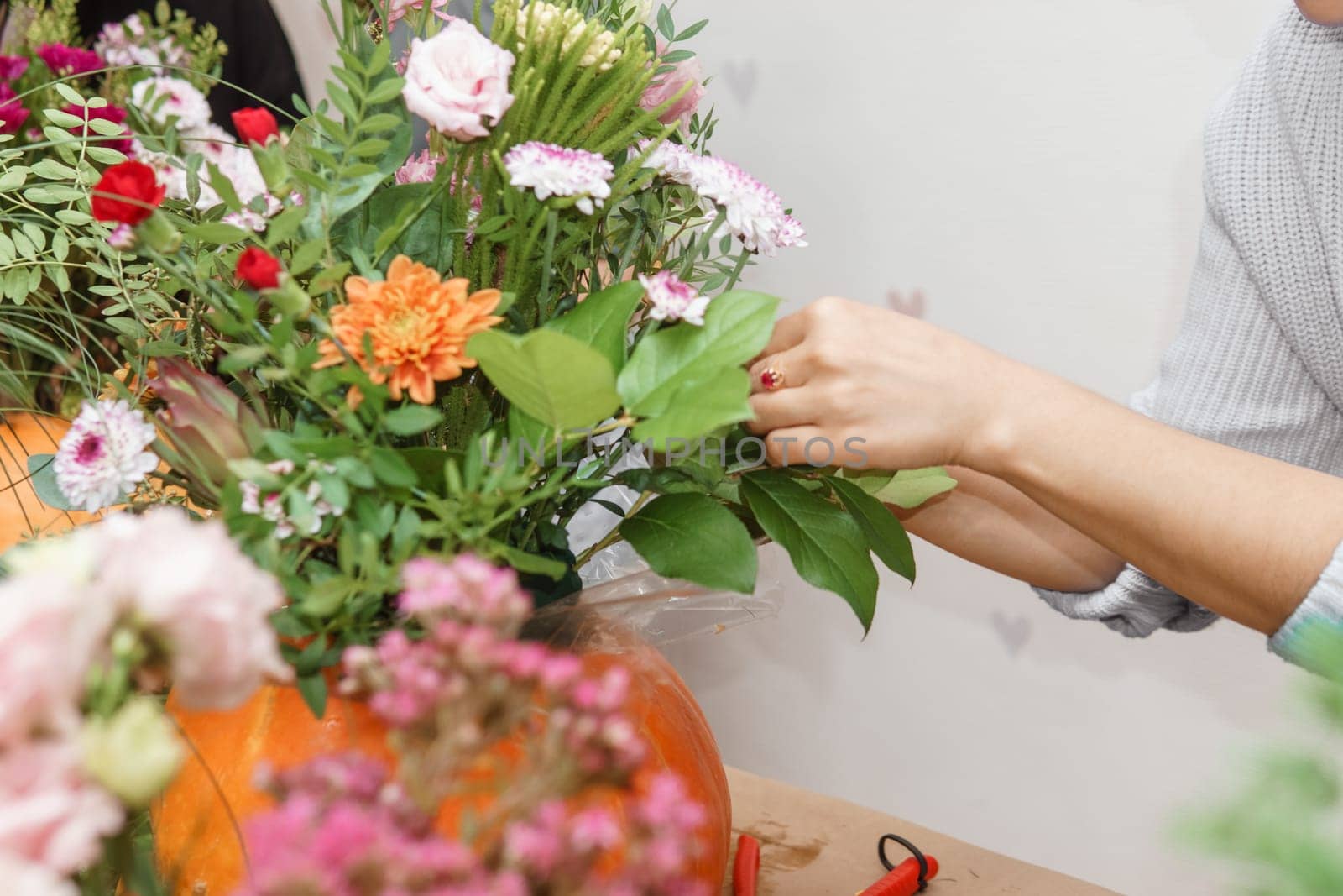 Creating a floral composition in a pumpkin. Making decor with your own hands