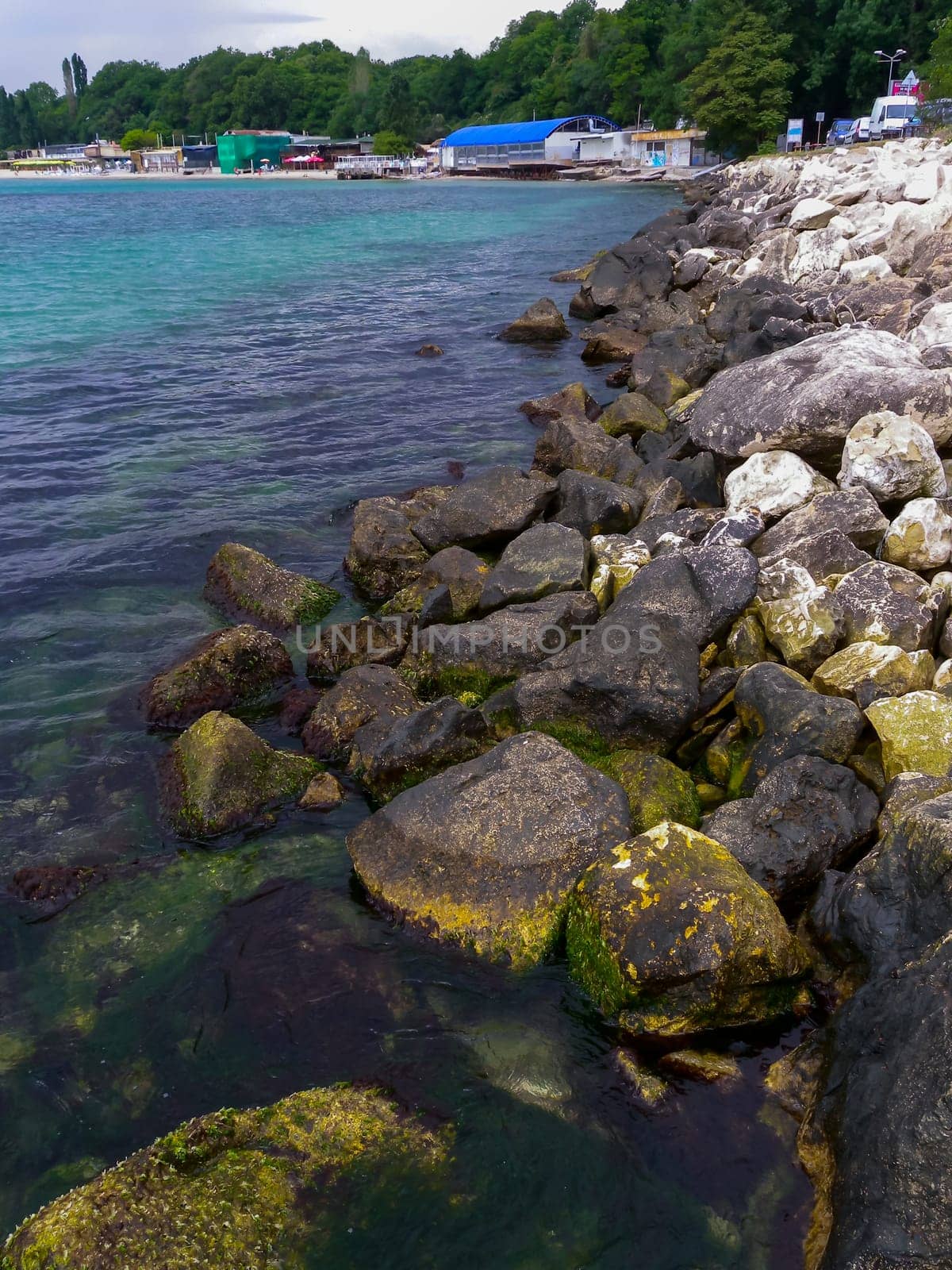 BULGARIA, VARNA - JUNE 06, 2013: Shore protection structures near the jetty made of large stones in Varna, Bulgaria