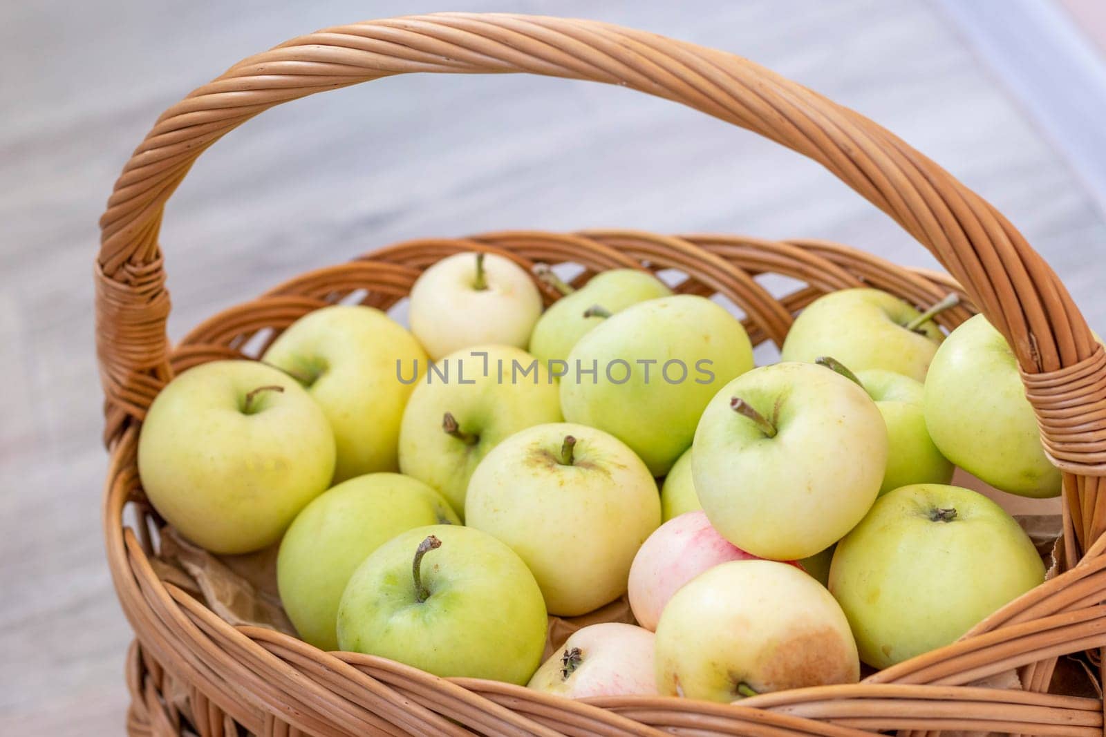 Shot of the freshly picked apples in the basket