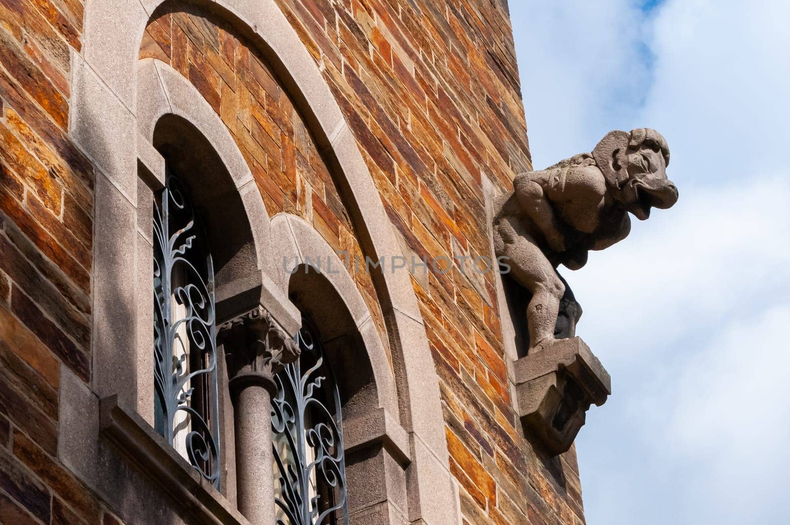 NANTES, FRANCE - SEPTEMBER 12, 2017: architectural elements on a historic red brick building in Nantes, France