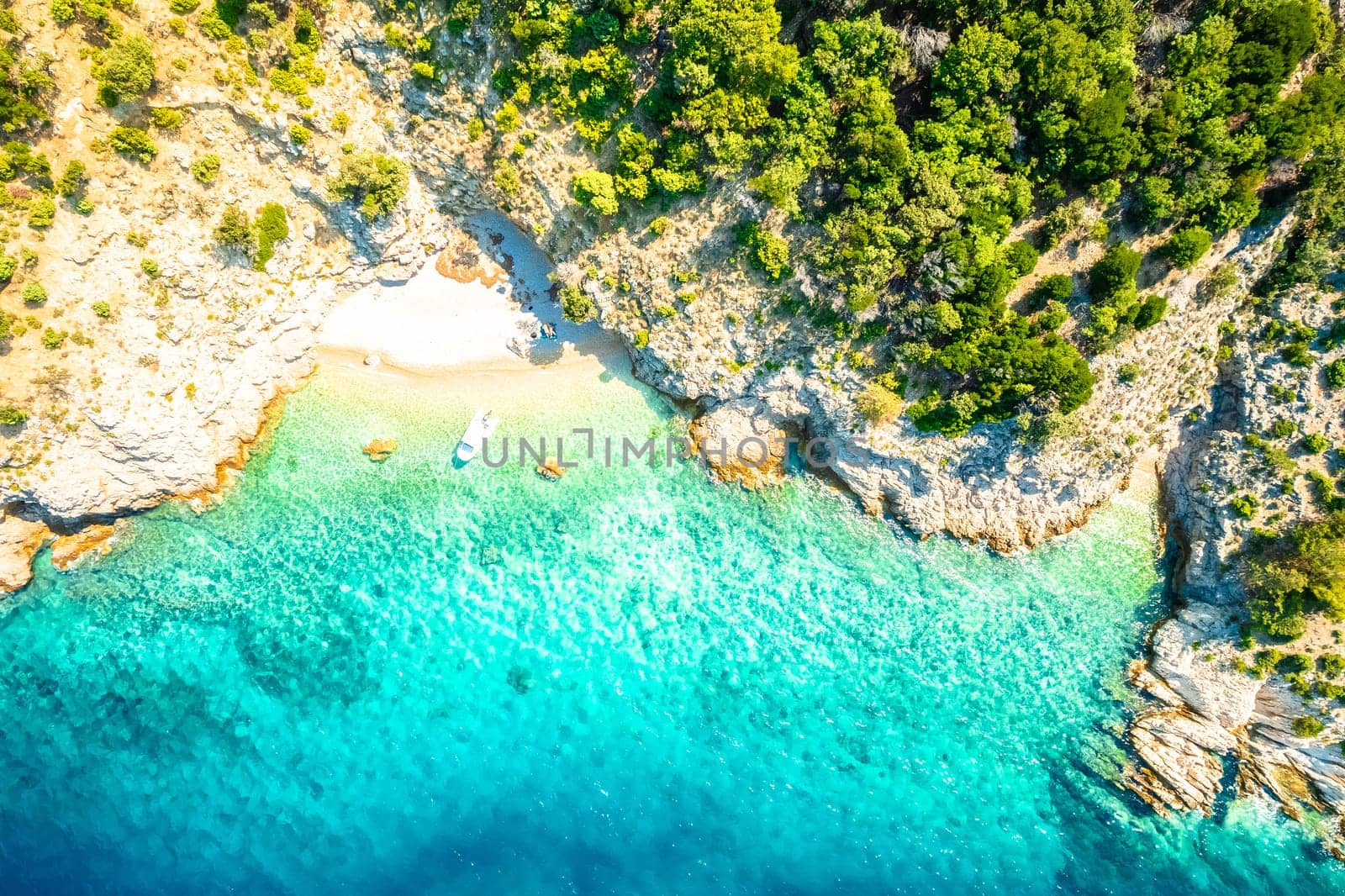 Idyllic hidden beach near Lubenice aerial view, Cres island of Croatia